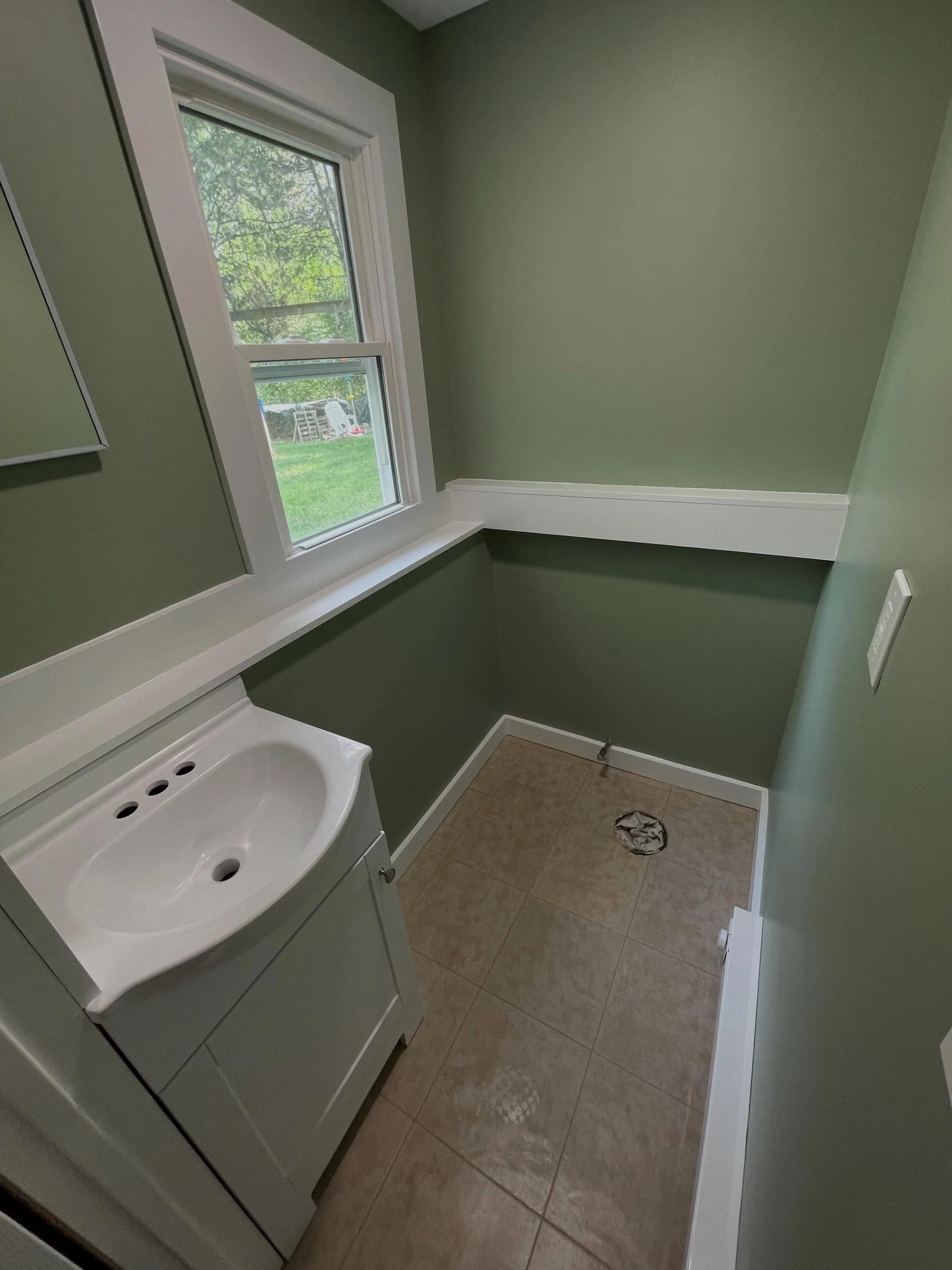 Much needed half bathroom renovation. Evicted some ants, used spare floor tile, and pulled it all together with clean trim &amp; wall color!