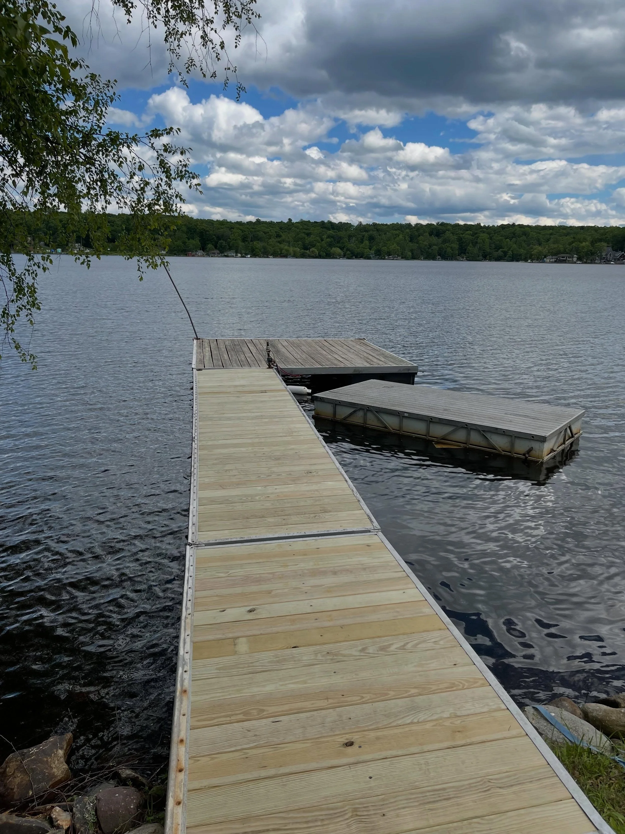 Breathing some new life back into this unsafe to walk dock. Removed the old decking, cleaned the frame up, and installed new pressure treated until it&rsquo;s time for a new composite dock! Sanded and lightly cleaned the main dock as the boards are s