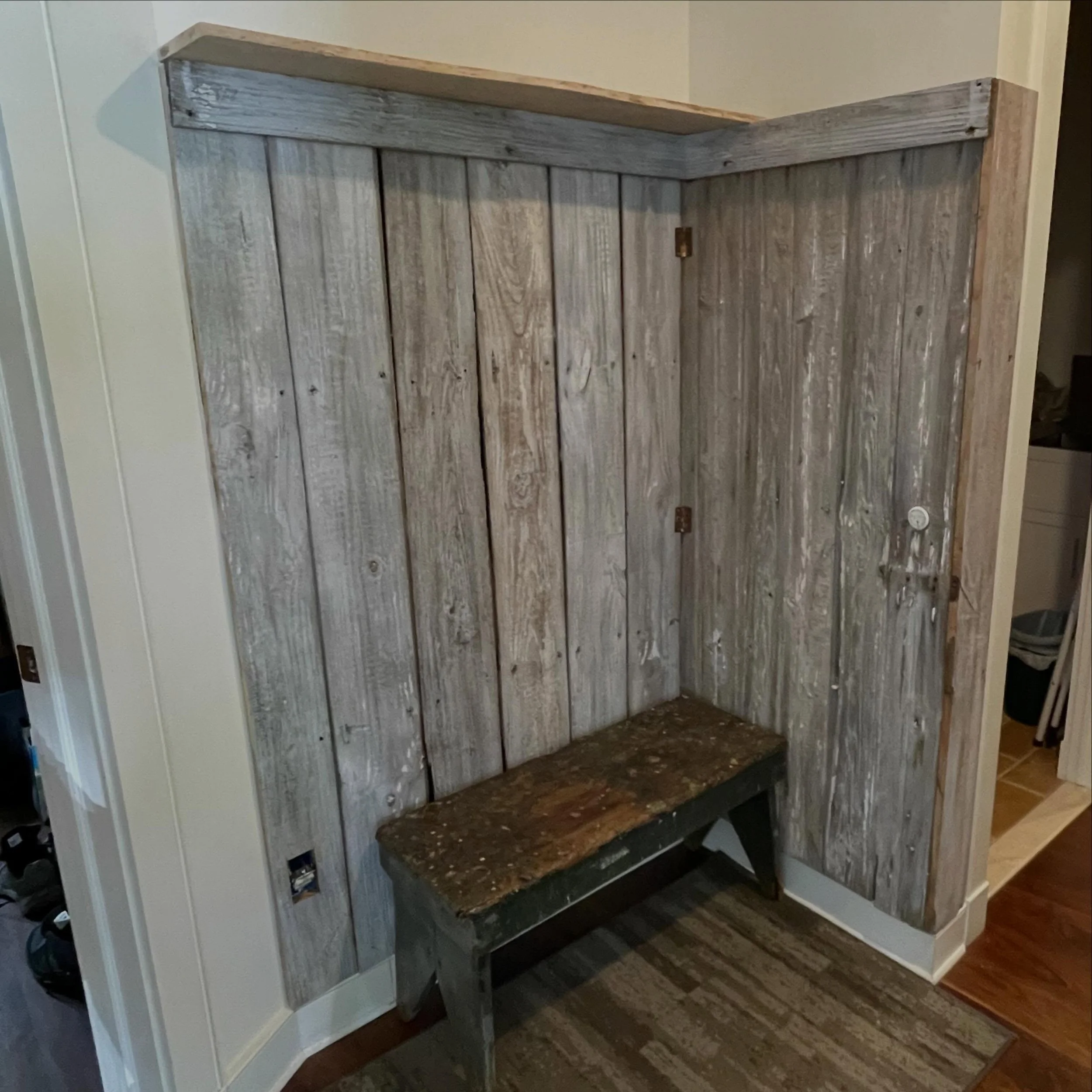 Keeping history alive at this home. The barn style wood came from the properties old well house. Now it gives character to the new homes entryway! #carpentry #trim #barnwood