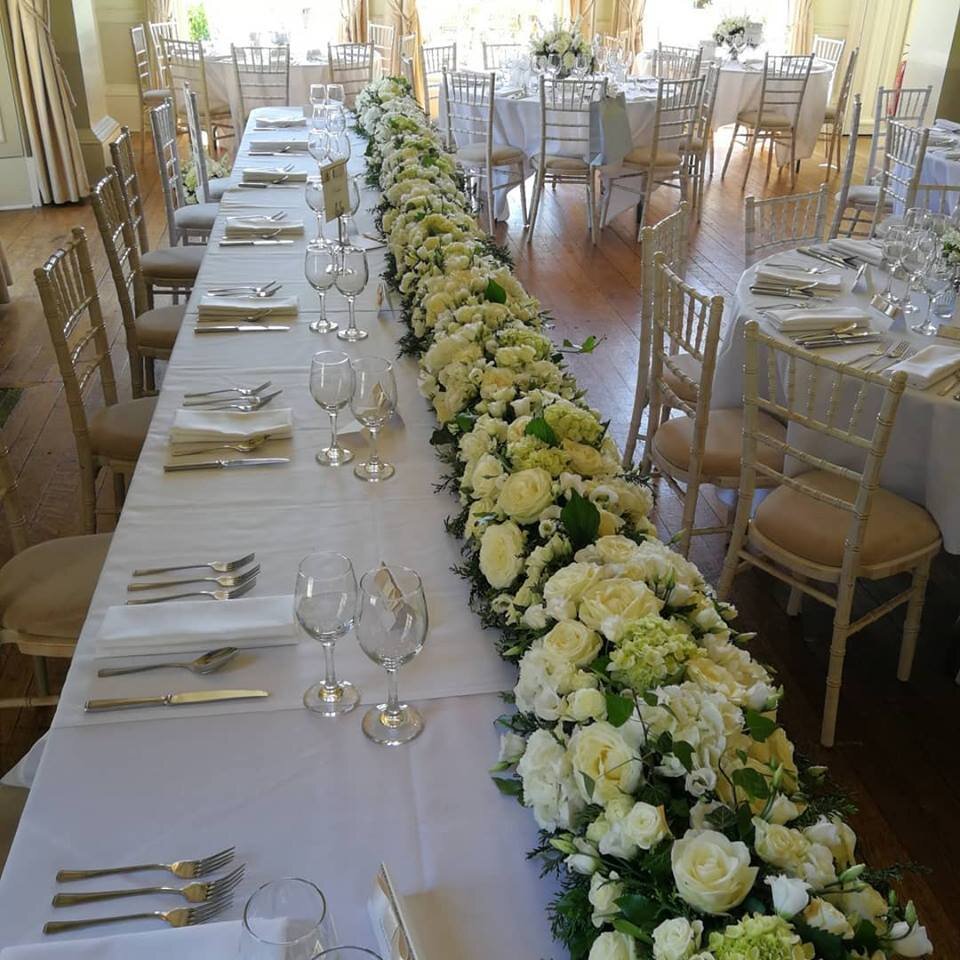 Prestwold Hall top table floral decoration.jpg
