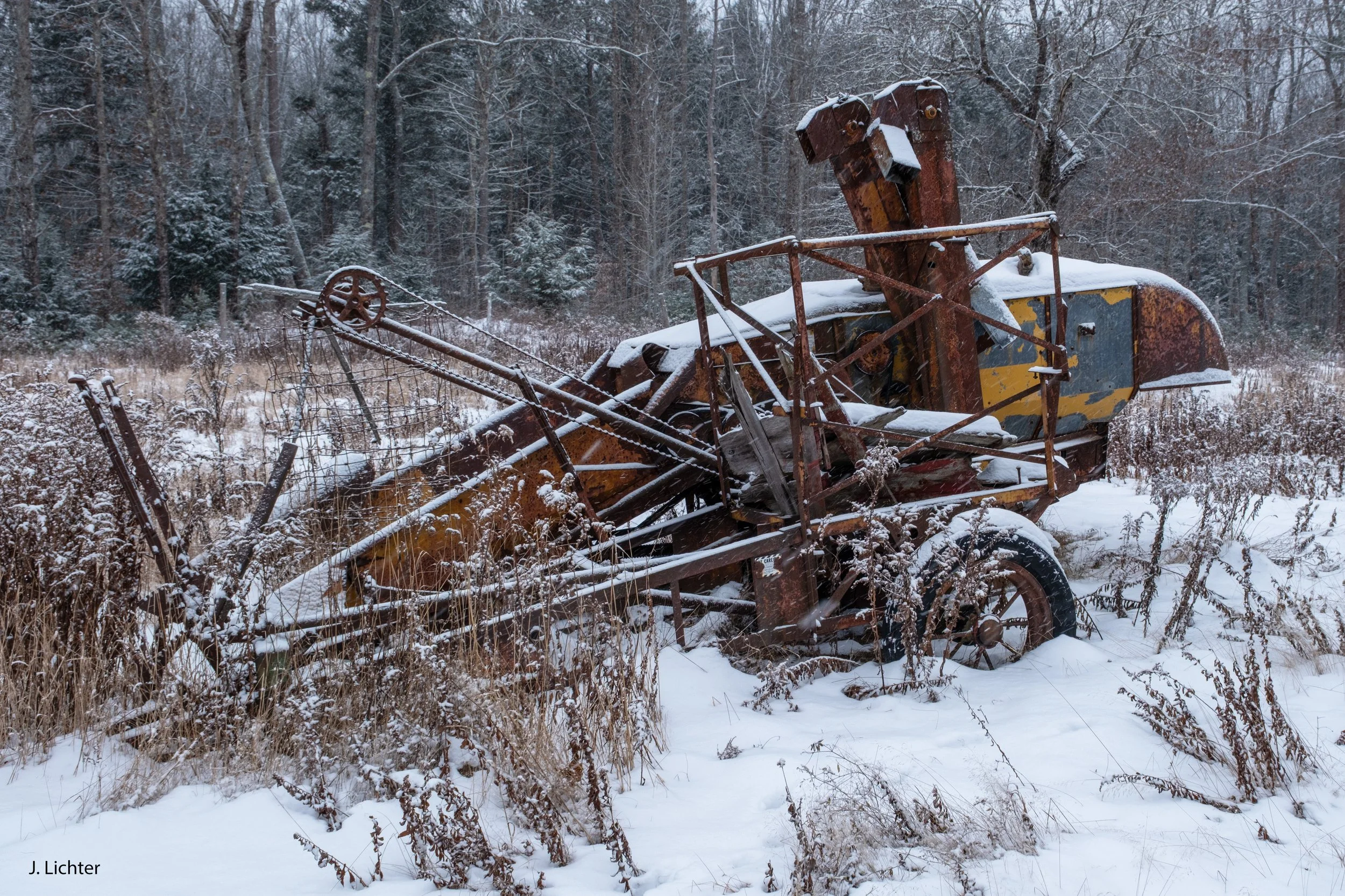 Old farm equipment.  Topsham, Maine.