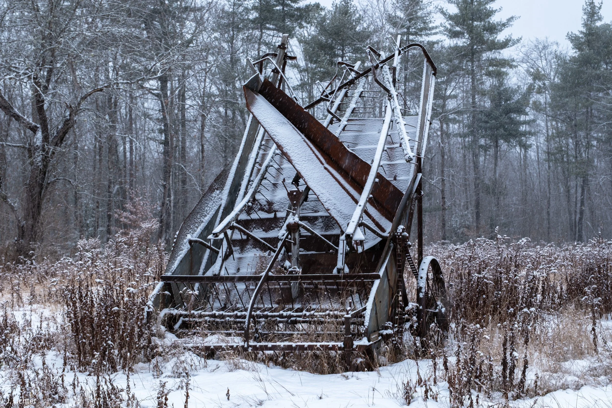 Old farm equipment.  Topsham, Maine.