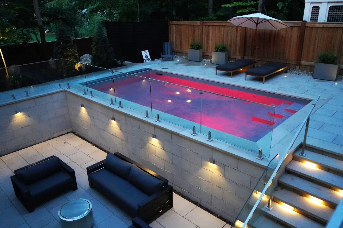 ✨ We just wrapped up a massive backyard transformation featuring:

A stunning new driveway

Elegant back patio &amp; steps featuring @techobloc and natural stone products 

Custom Italian porcelain BBQ island with LED strip lighting

Luxurious raised