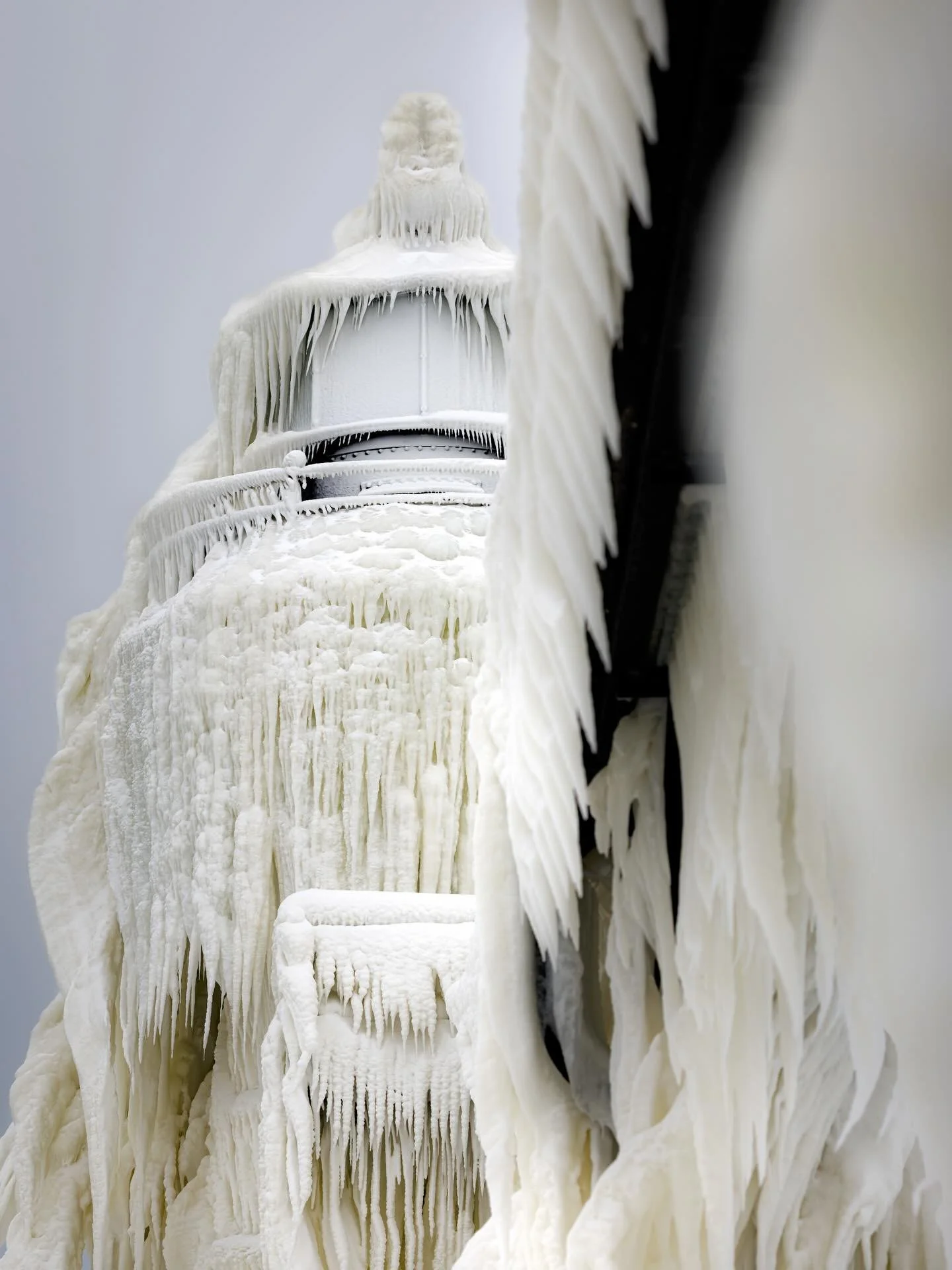 Winter can hold beautiful things .. #winter #wintersgrip #ice #lakemichigan #lighthouse