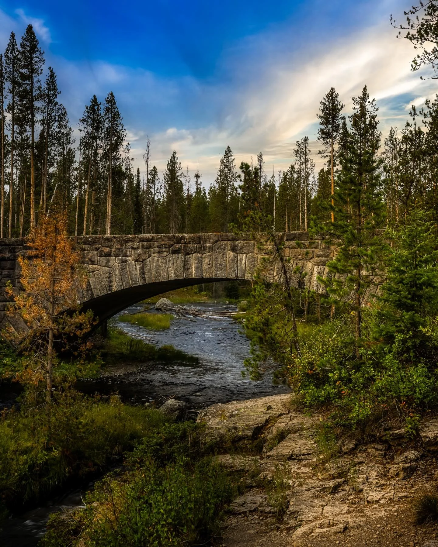 There&rsquo;s a small stone bridge tucked away in Yellowstone that most people barely notice. They drive right past it chasing geysers and waterfalls&hellip; never realizing there&rsquo;s a quiet kind of power standing right there in the cold.

I&rsq