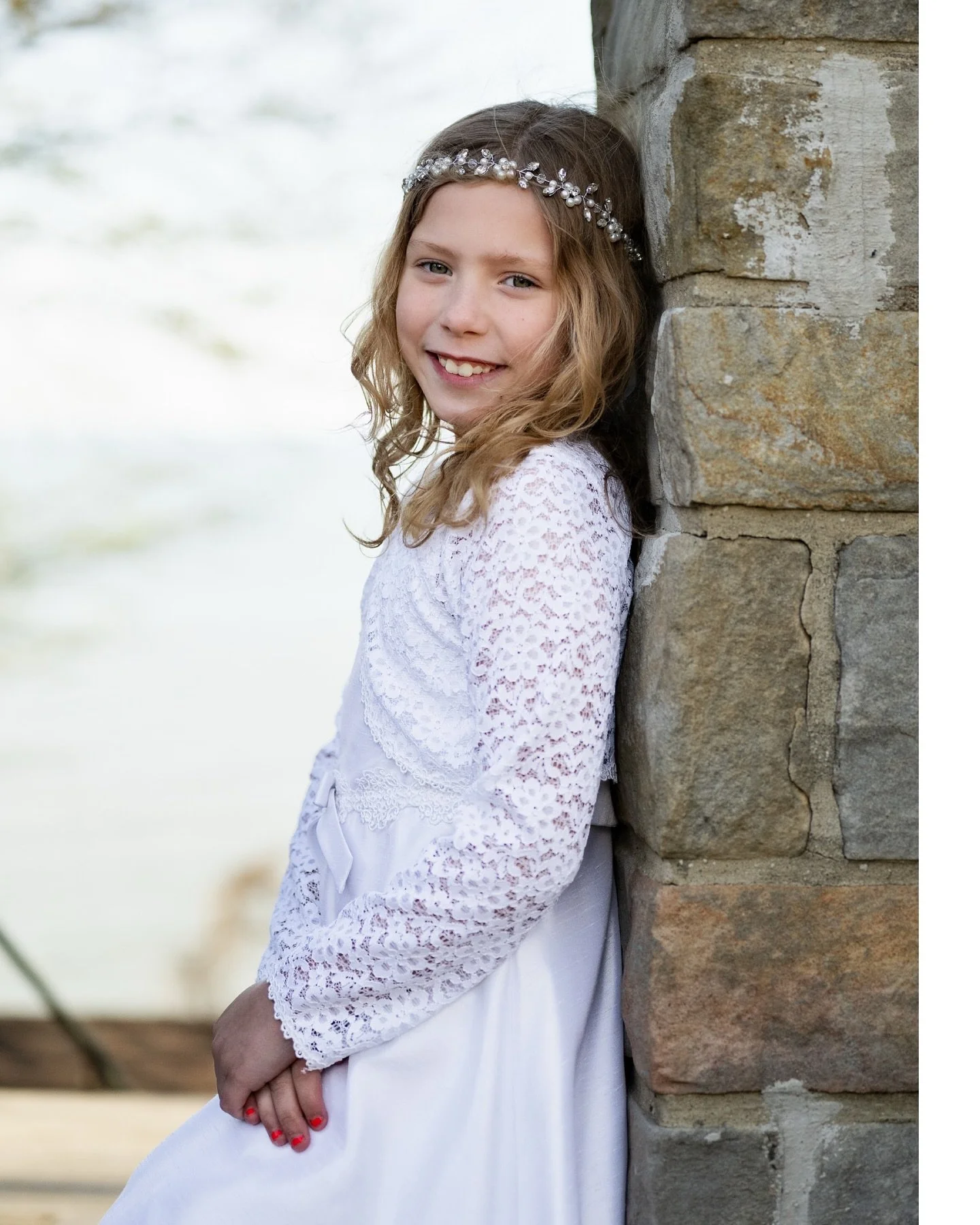 Some moments are significant.

Others feel like sunshine and laughter on your skin.

This session was both. ✨

We started with a few quiet (but also silly!) portraits in her First Communion dress&mdash;full of grace and joy. Then came the snuggles, m