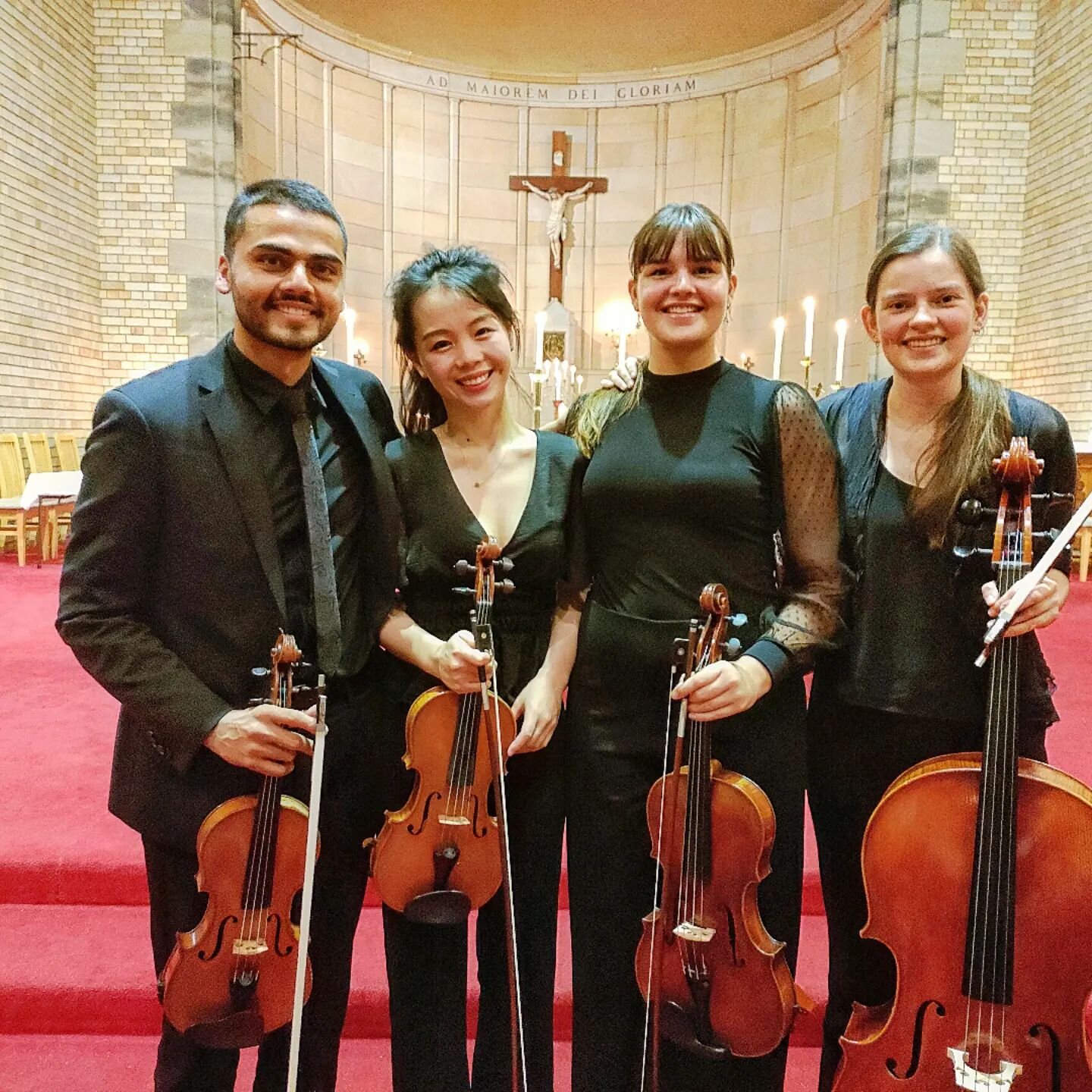 The Rosemont String Quartet are all smiles after performing Schubert's Rosamunde Quartet for St Mary's Lenten Concert