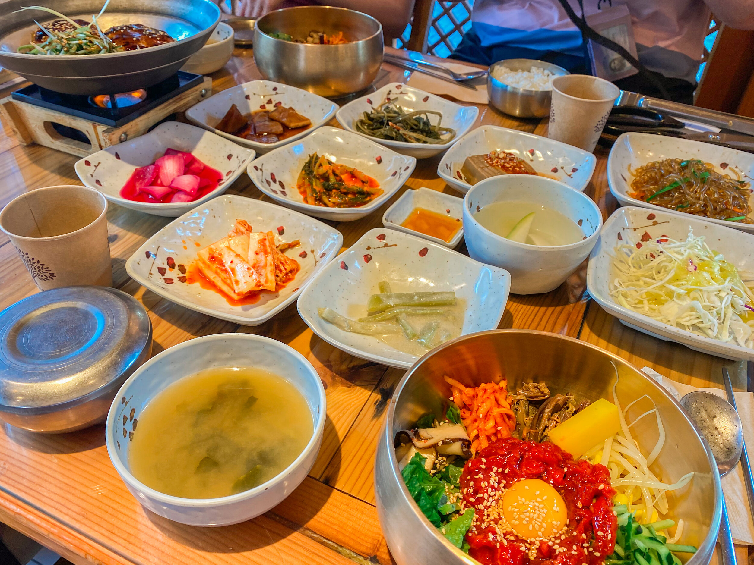 raw beef bibimbap and banchans