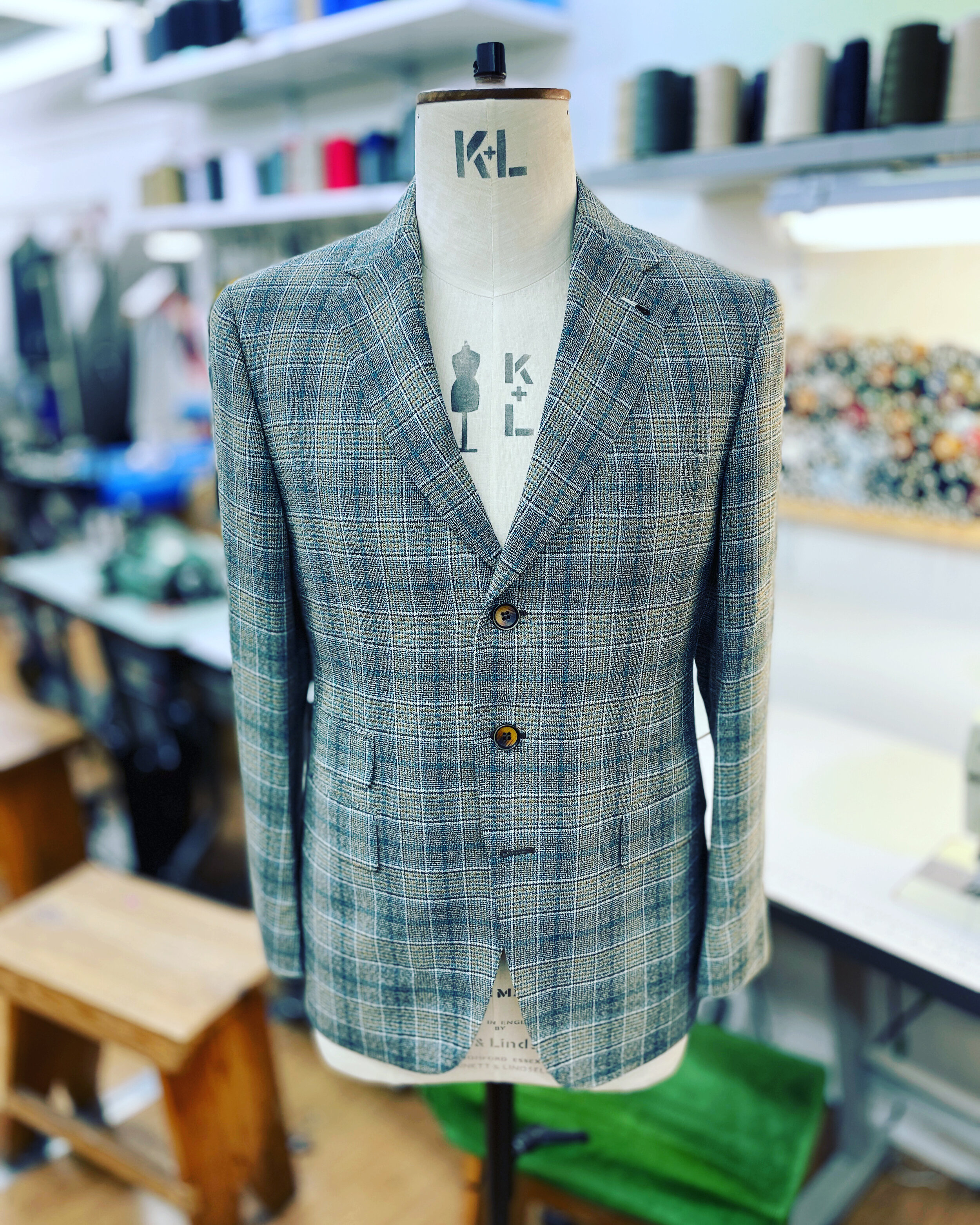Bespoke olive and cream plaid jacket made with Cerutti fabric for one of our clients Panny Loucas at PricewaterhouseCoopers