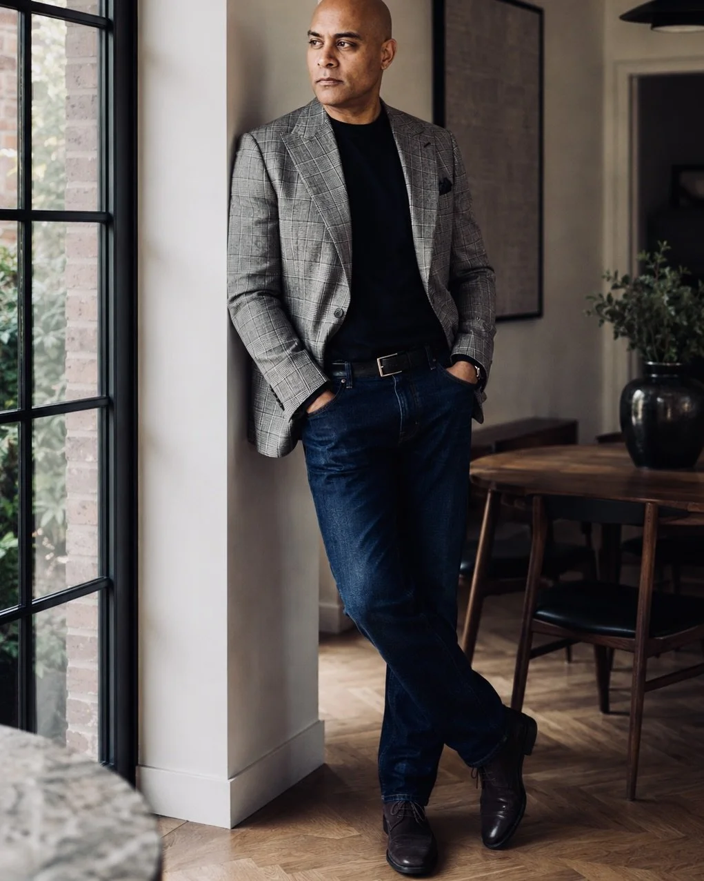 Roberto Revilla in bespoke jeans, custom leather chukka boots and bespoke jacket all by Roberto Revilla London showing how jeans should fit