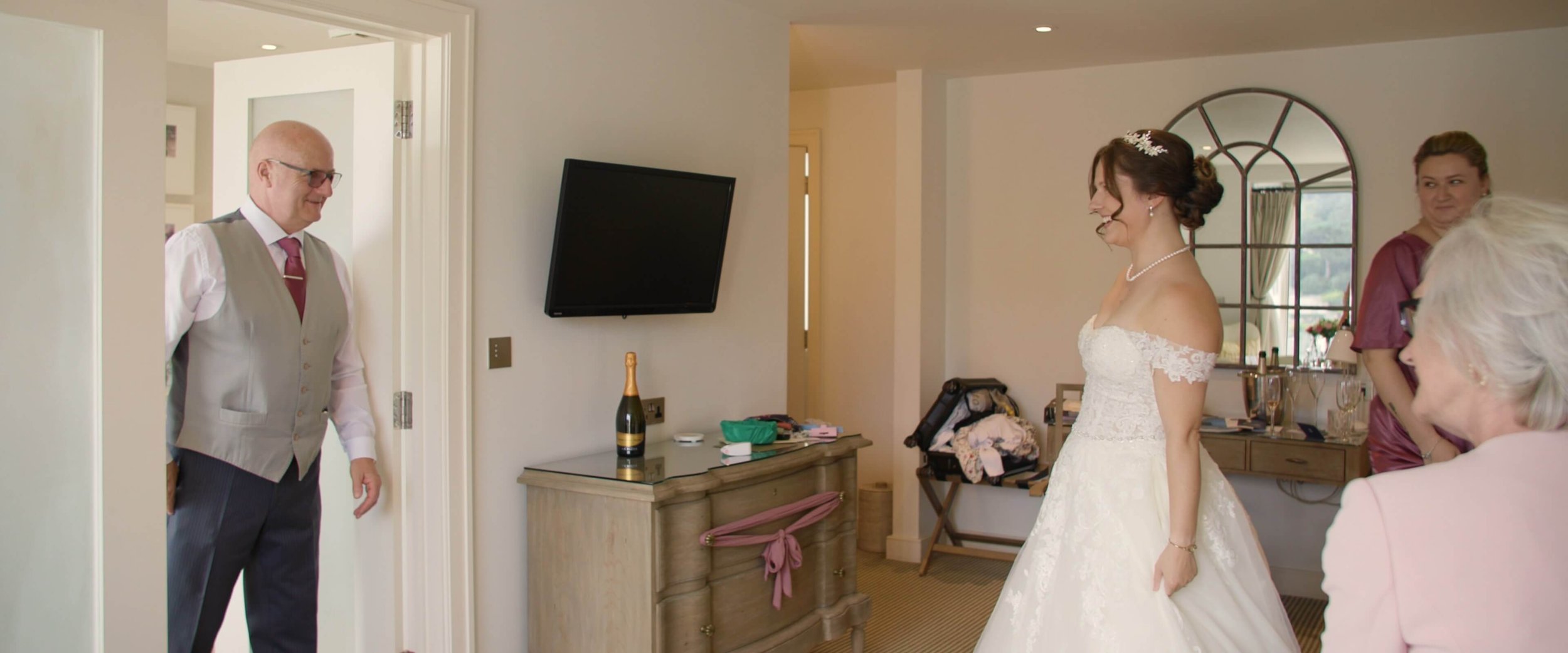 Amy's father sees her in wedding dress for the first time