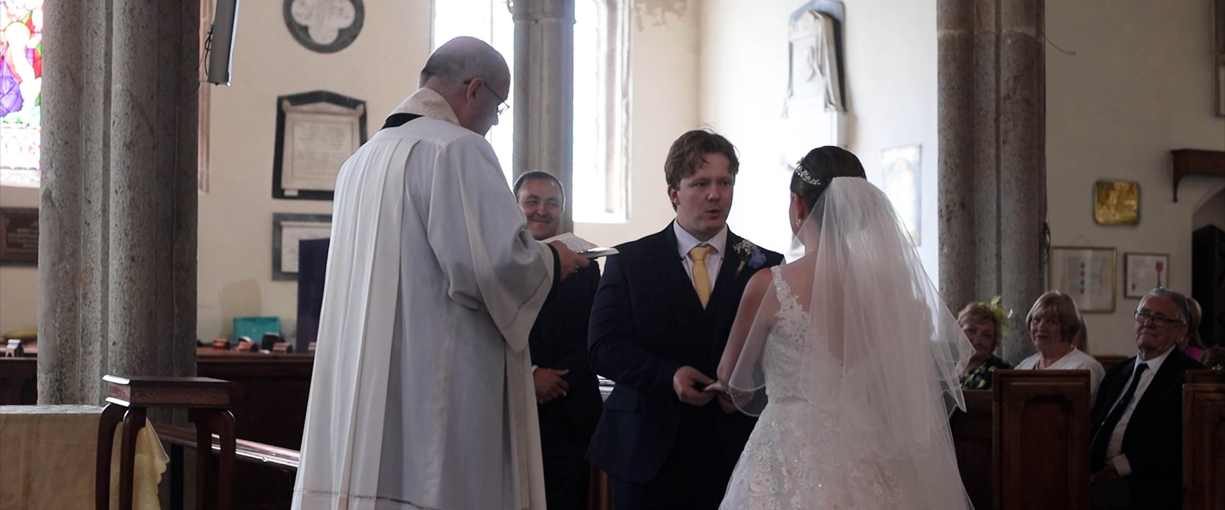 Vicar performs 16th Century vows to Dael &amp; Emma during the church wedding ceremony
