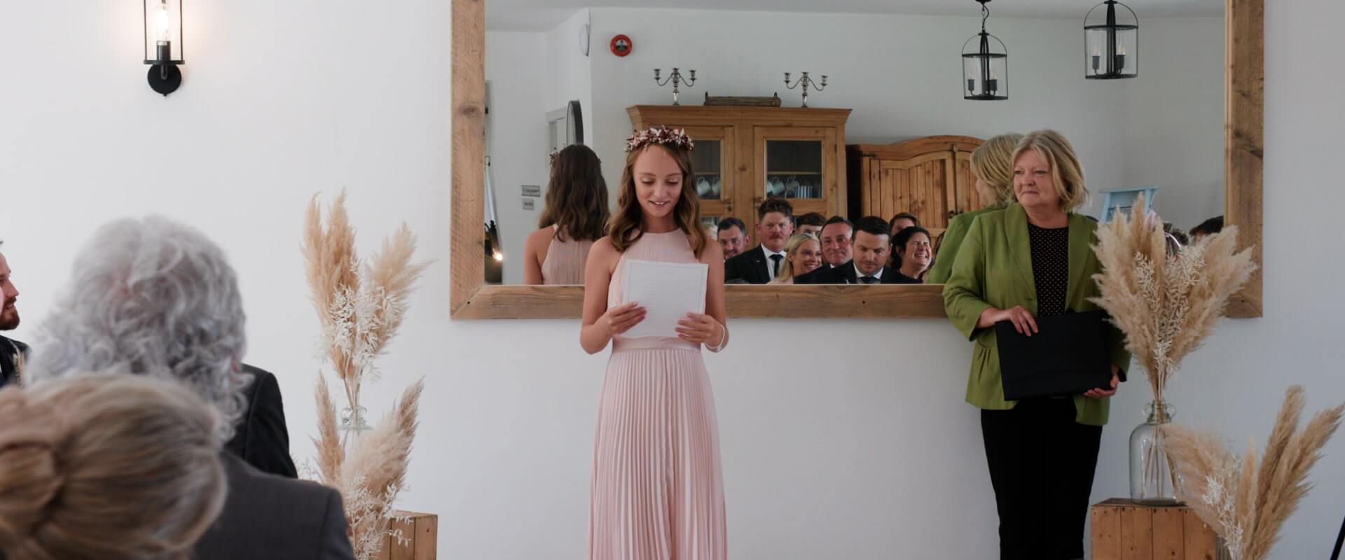 Michelles daughter (bridesmaid) perfoming a reading during the wedding ceremony