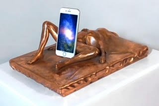 ‘Origins of the Universe’, Copper-plated sculpture with iPhone