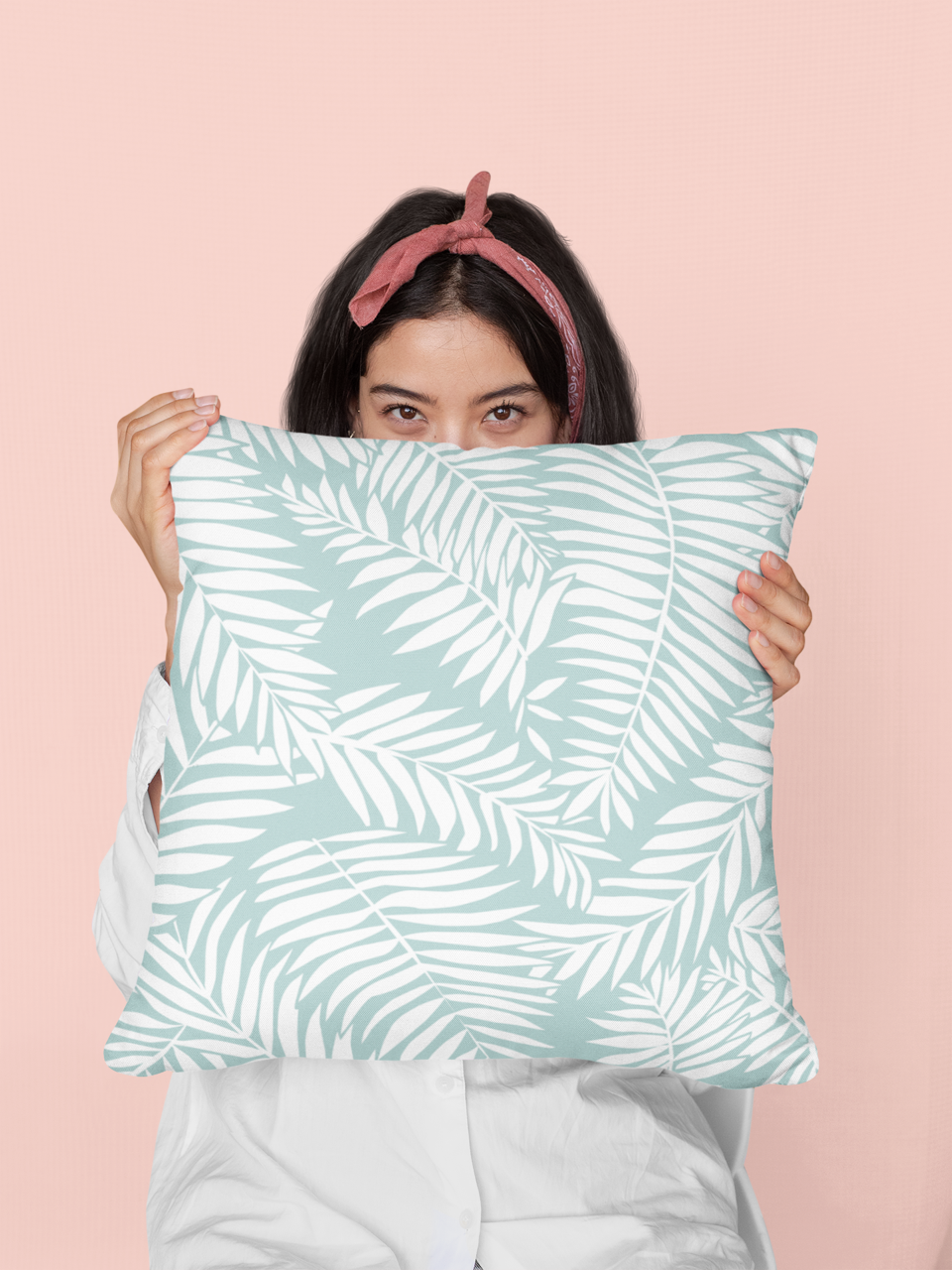 mockup-of-a-woman-covering-her-face-with-a-pillow-at-a-studio-29020.png