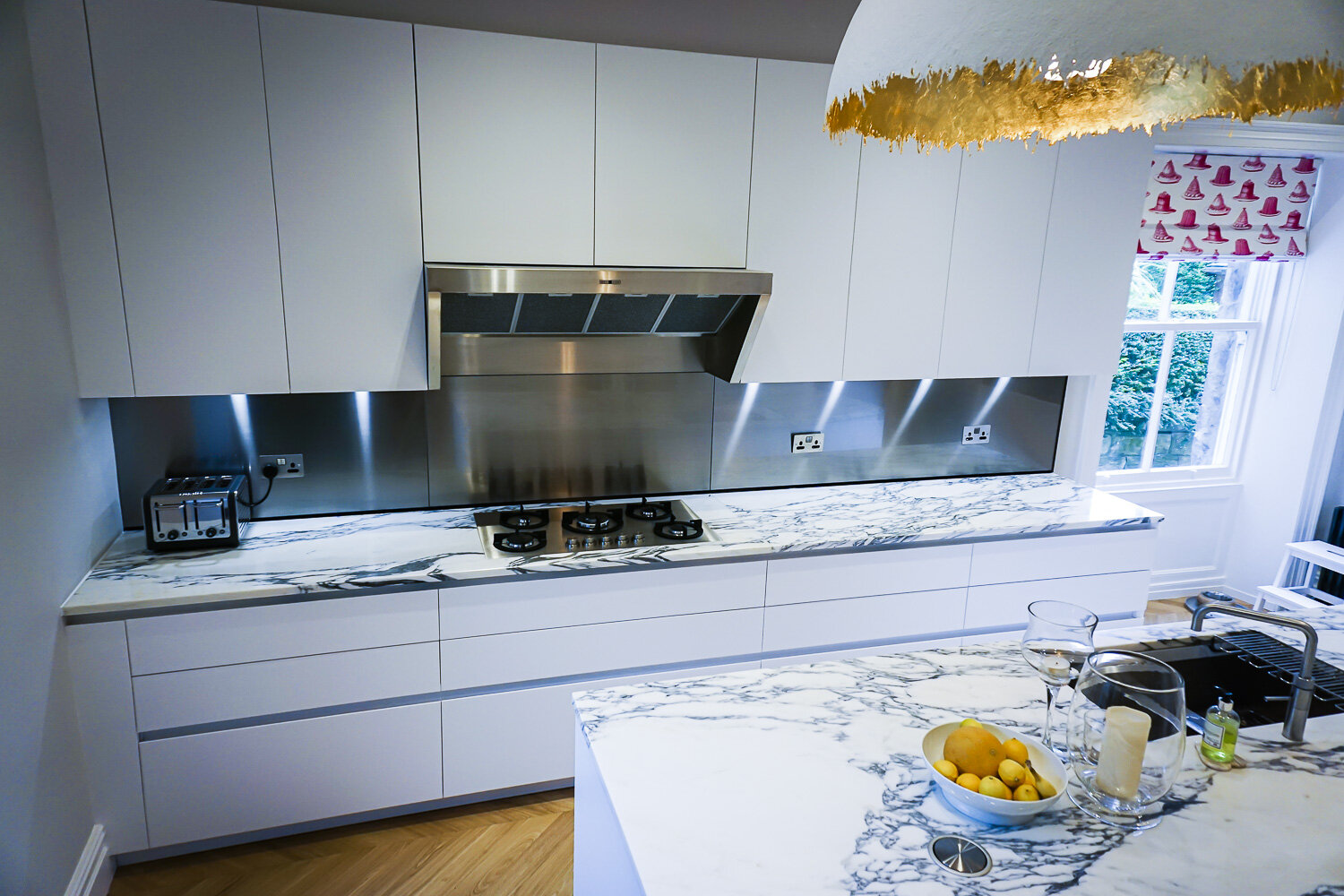 harrogate-euromobil-antis-matt-white-lacquer-handleless-kitchen-with-arabascato-marble-worktop (12 of 14).jpg