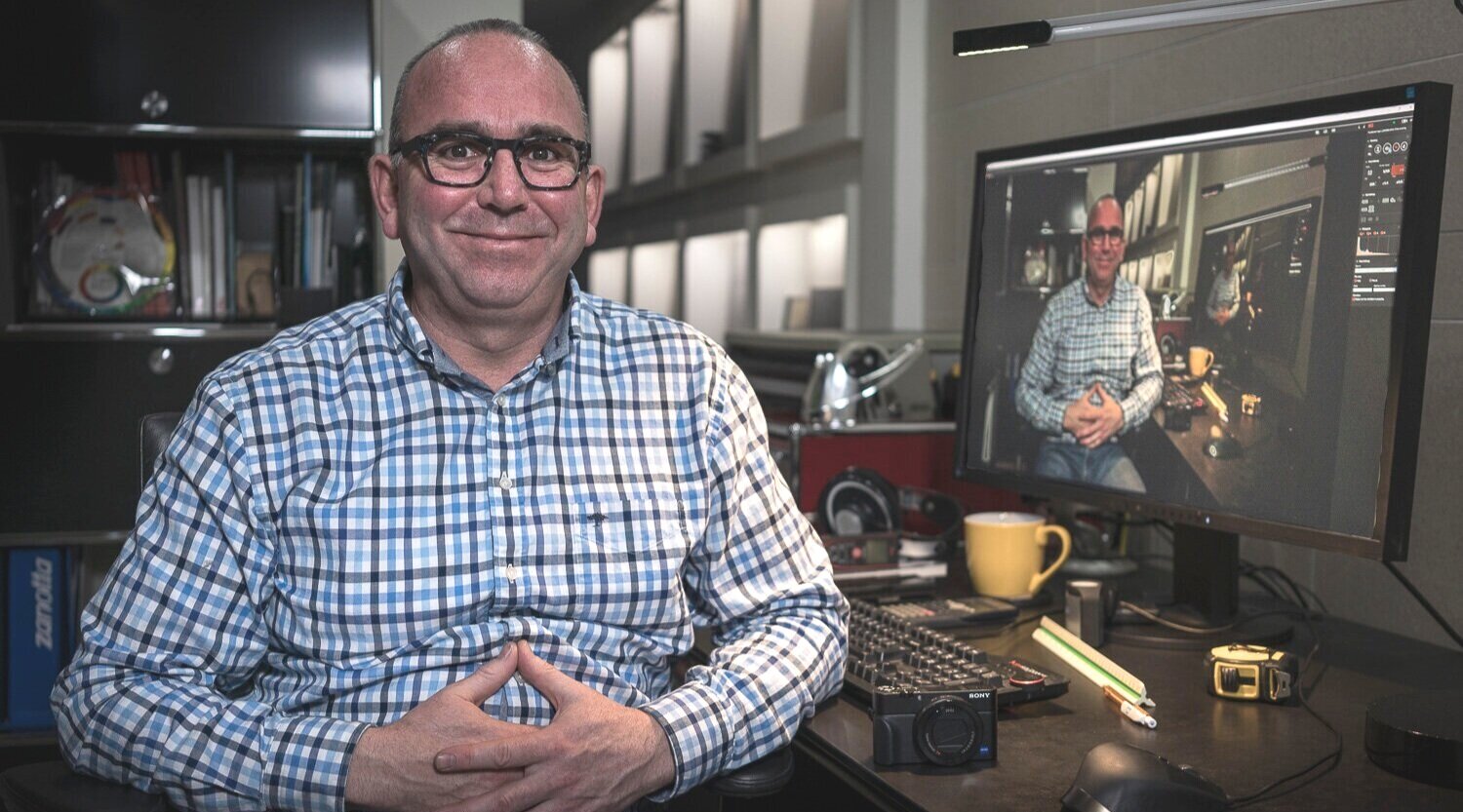 Kevin-Large-at-Desk-1.jpg