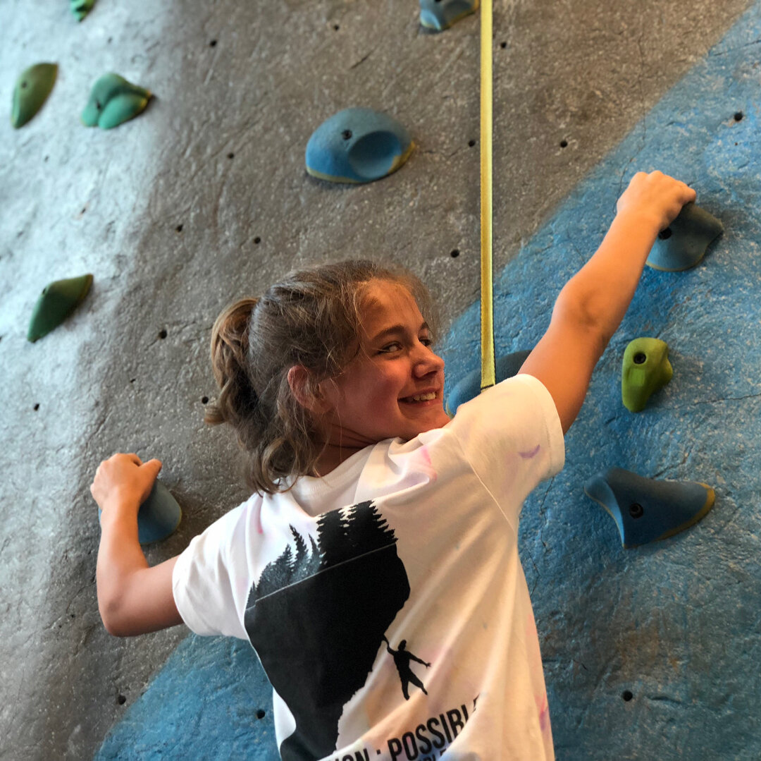 Wonder in the Woods Girl Rock Climbing.jpg