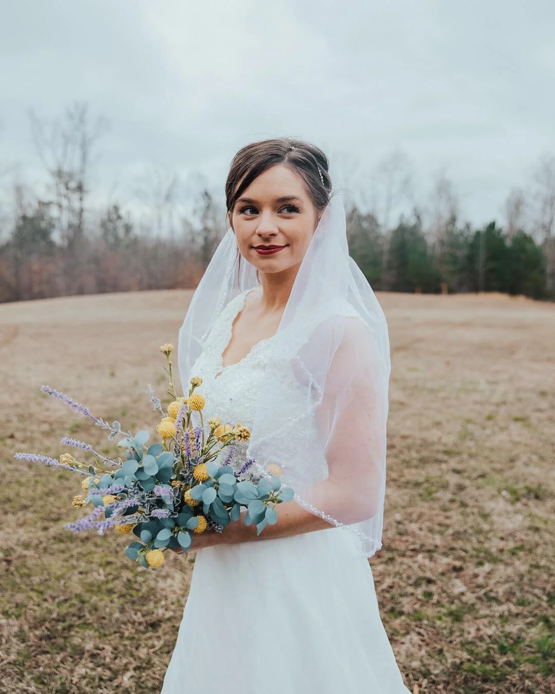 Johnston Woods Bride in Field.jpg