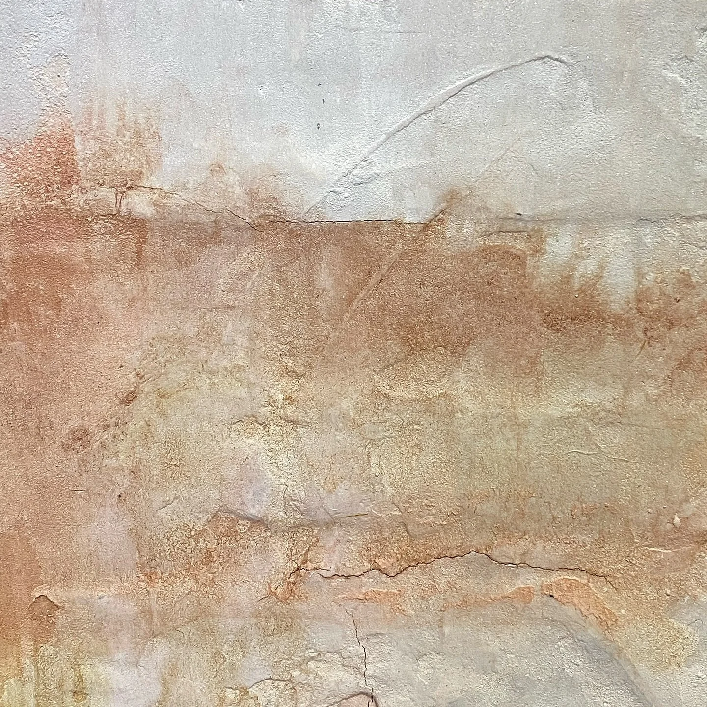 A close up of Clay Ground, highlighting the textured breaks in compound with pops of shimmer. 🧡