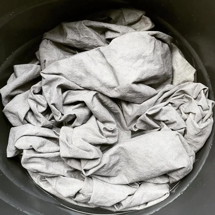 Fabric dyed using japanese mineral dye during fiber class