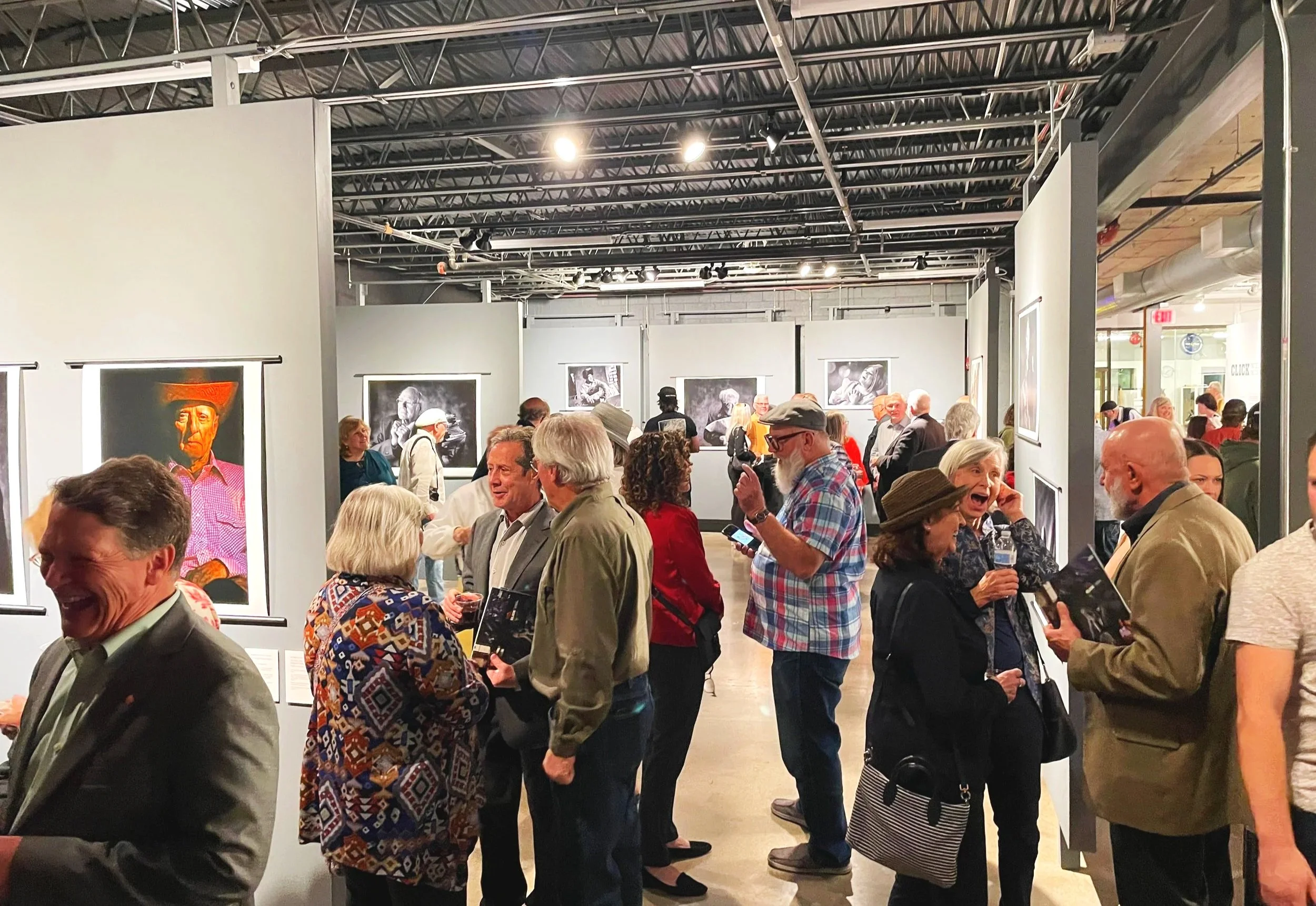 crowd observing gallery space