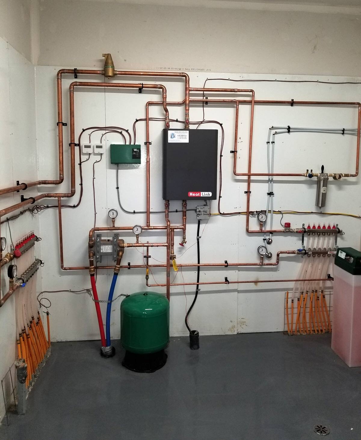 Barrie_Mechanical_New_infloor_heating_system_concted_to_a_wood_boiler.jpg