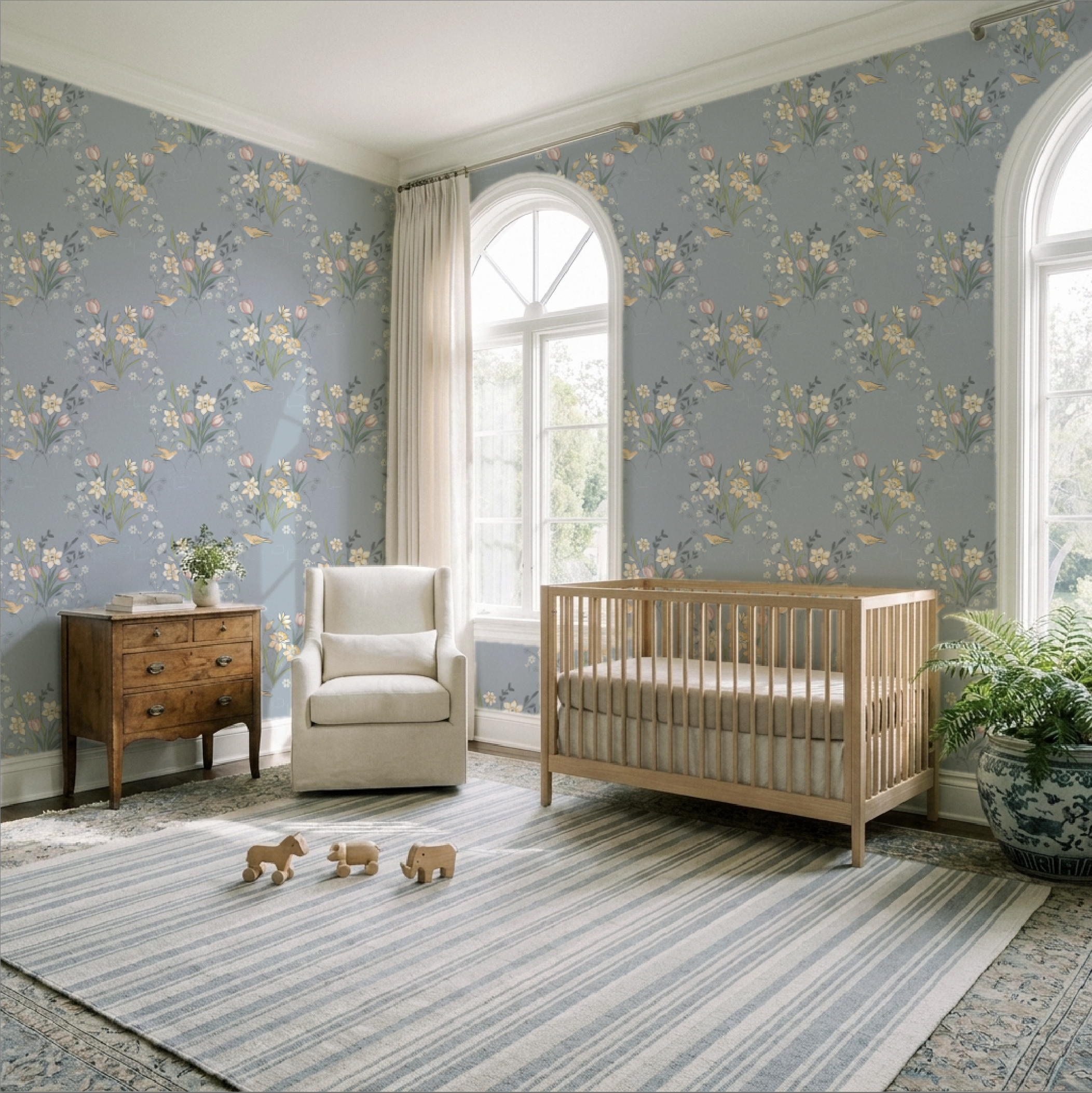 cheery floral wallpaper in a dusty blue background for the nursery or welcoming space