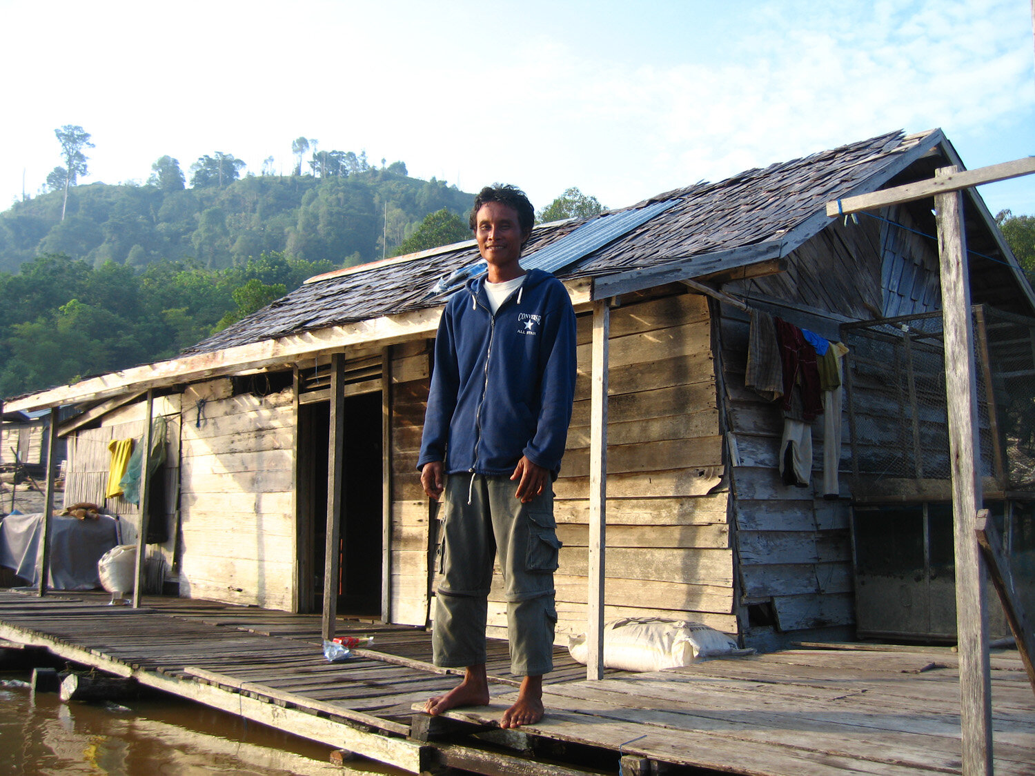 Yeffri, the forest ranger and his Tekanung home.jpg
