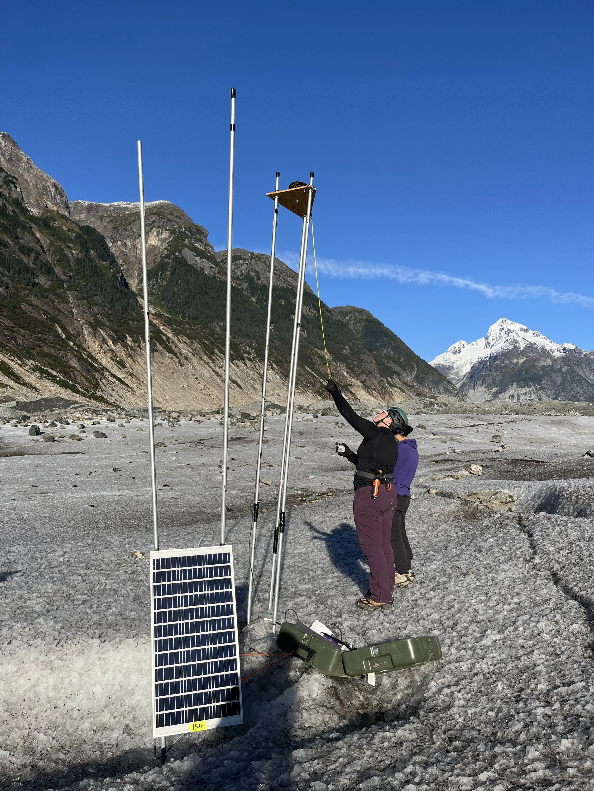  Measuring the summer’s thinning near the Gilkey Glacier terminus in September 2025 (Photo credit: William “Billy” Armstrong) 