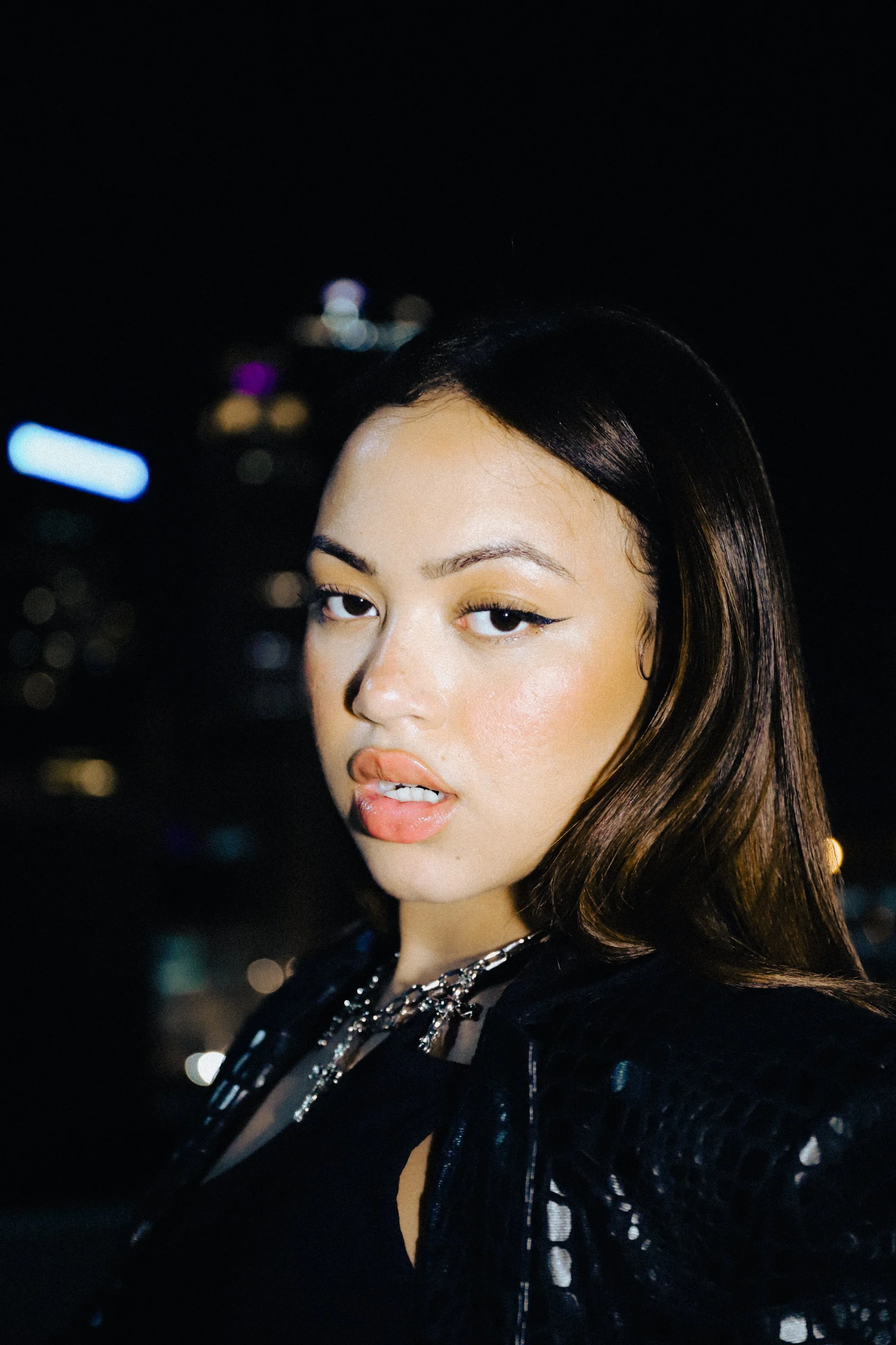 fashion image of woman in atlanta at night