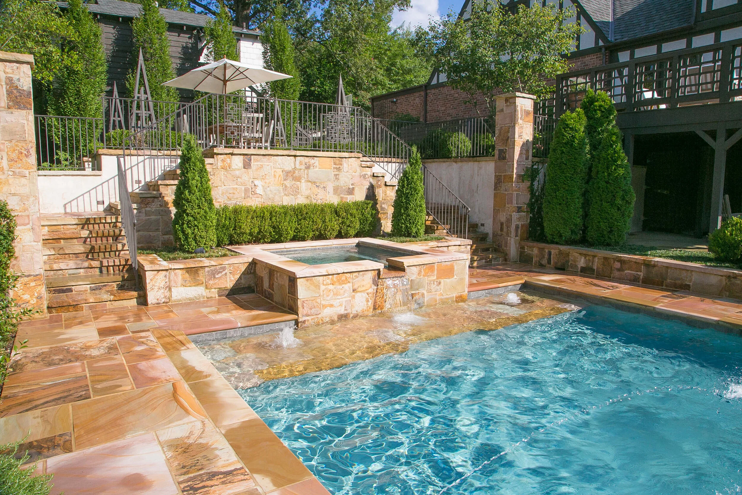 Stone 4_hot tub and tanning ledge.JPG