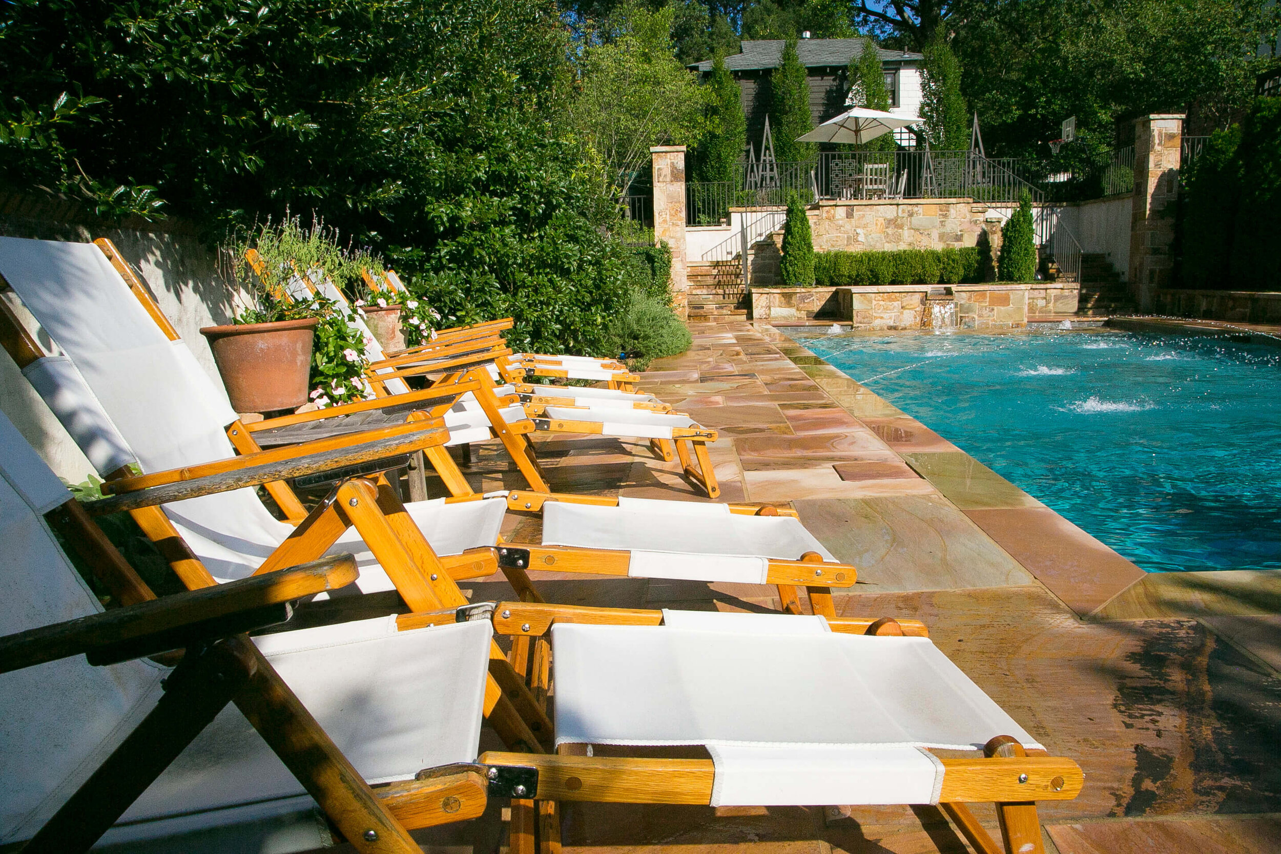 Stone 1_chaise loungers and pool.JPG