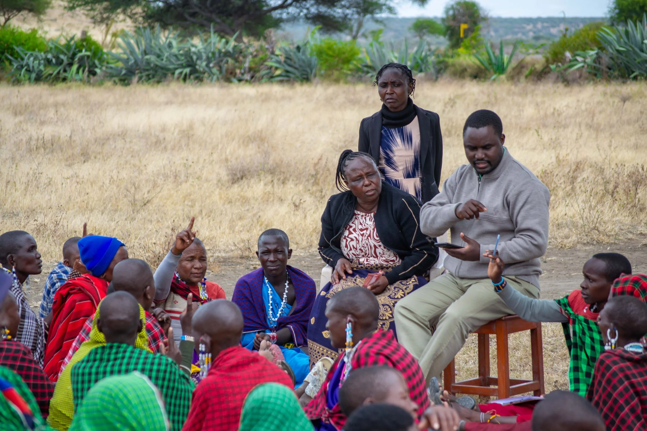 Leading a business training session.