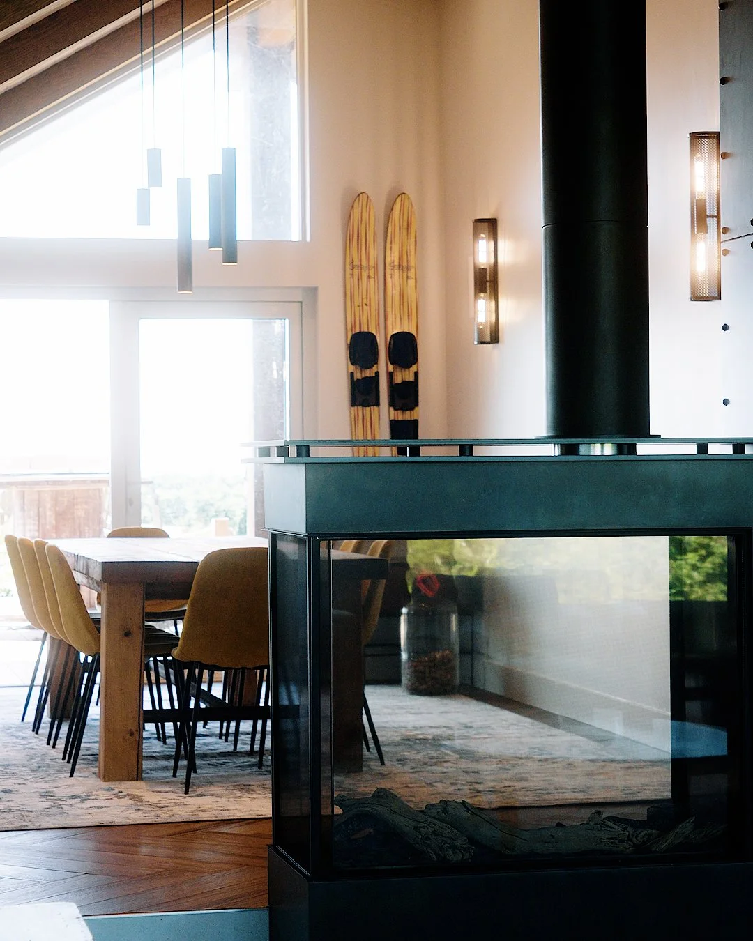 Pacific Northwest custom home renovation exposed metal accents and wood beam ceiling