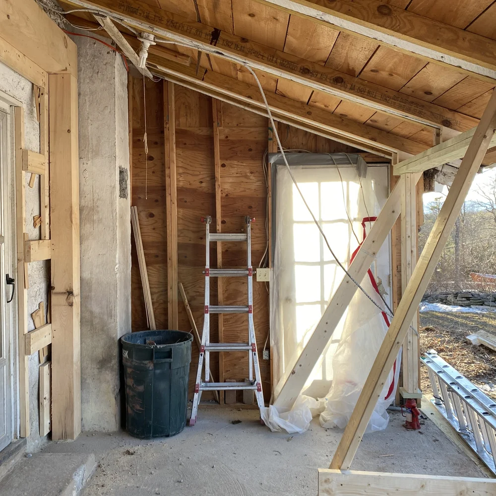 The West wall that once lead to a screened-in porch