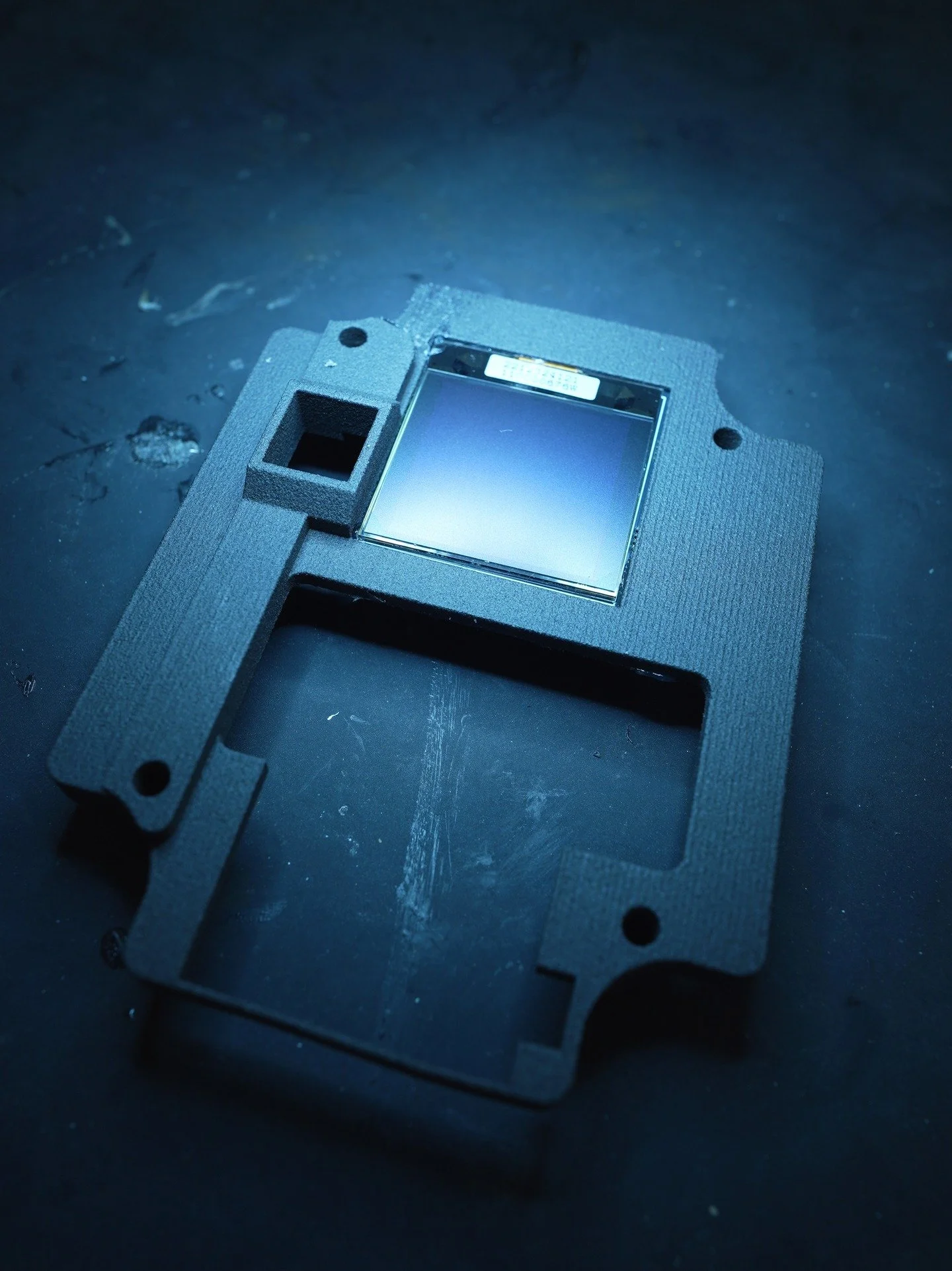 This is the shroud of the G1 plant Setup. It's purpose is to cover the underlying electronics, keep the USB port, for updating code, rigid, and to hold the 128x128 OLED display. 

The OLED display is held in place by a rtv sealant. The same sealant s