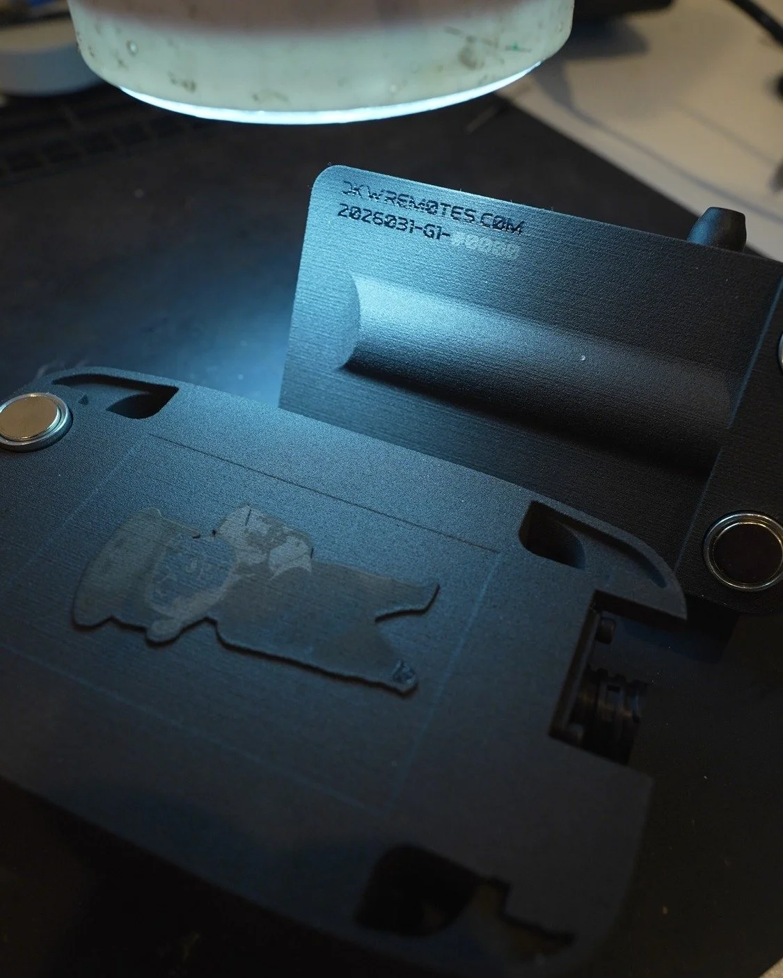 All G1 hand remotes will be engraved with production date and serial number. 

Also, I'll probably engrave a personalized third line if requested.

Displayed in this picture is production version of the G1 receiver lower blank and a pre production ha