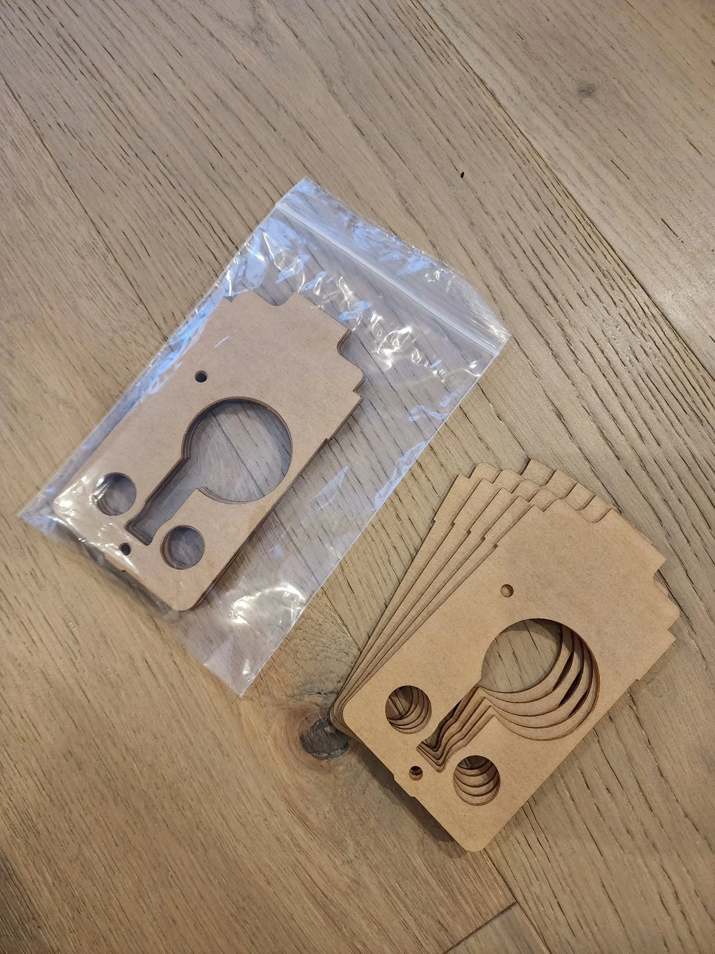 two months of humming and hawing, finally got a screen protector design delivered in quantity. Will ship each package of 5 with two replacement screws.

When I screw on the two number 6-32 screws, I use a bit not a screwdriver. And, I just thread the