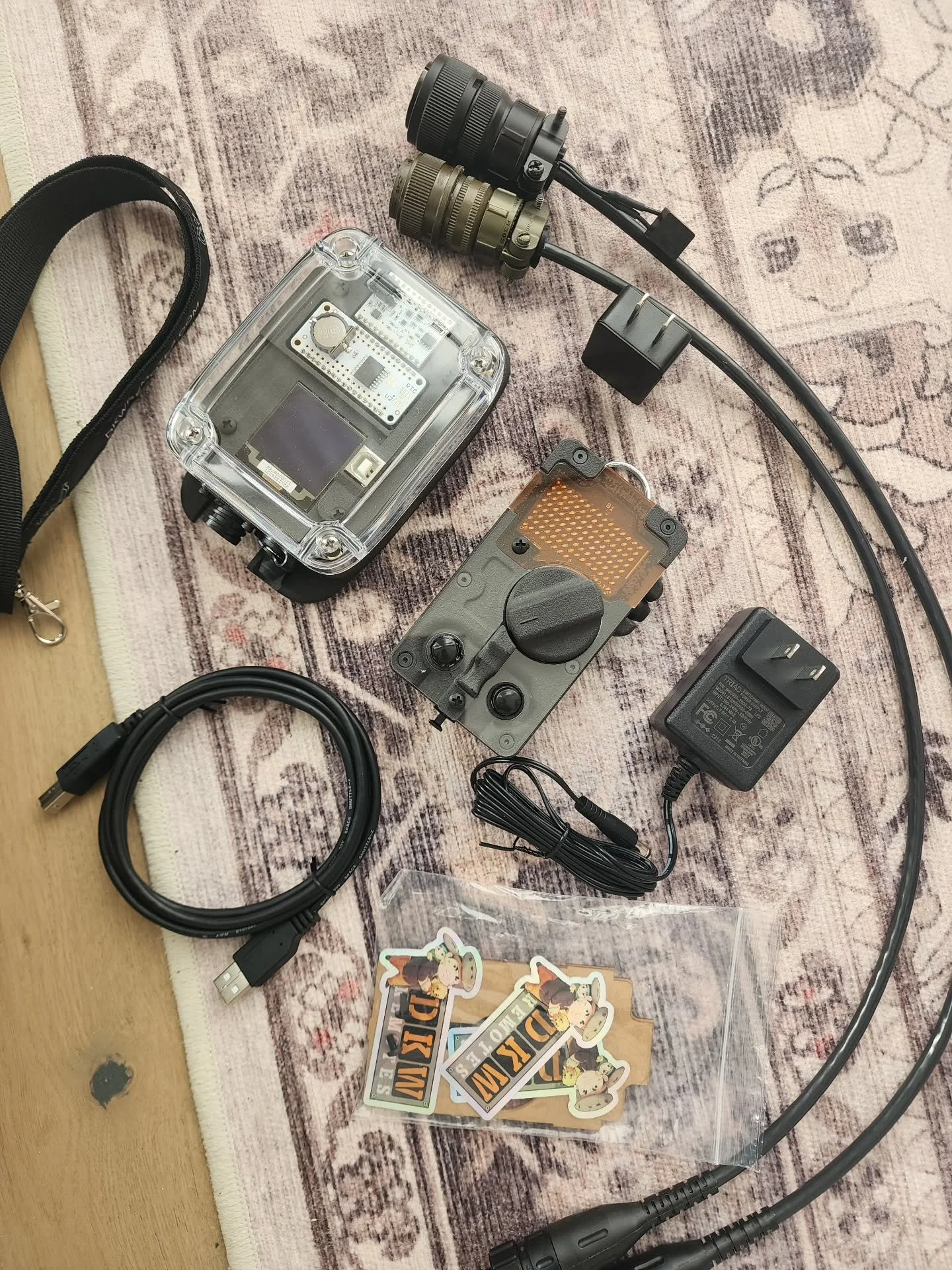 G1 Plant Setup I completed yesterday. Heading to Orange, TX. 

Kit has the following:

1. Receiver
2. Hand Remote
3. Lanyard
4. 3 screen protectors
5. Pair of 6-32x1/4 replacement screws
6. Receiver wall mount charger
7. Hand Remote charging/code_upd