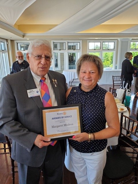  Margaret Mudron, past Treasurer of the Occean City Berlin Rotary Club received the Avenues of Service Award by Past District 7630 Governor Hugh Dawkins for her service to her club during the 2021-2022 year. 