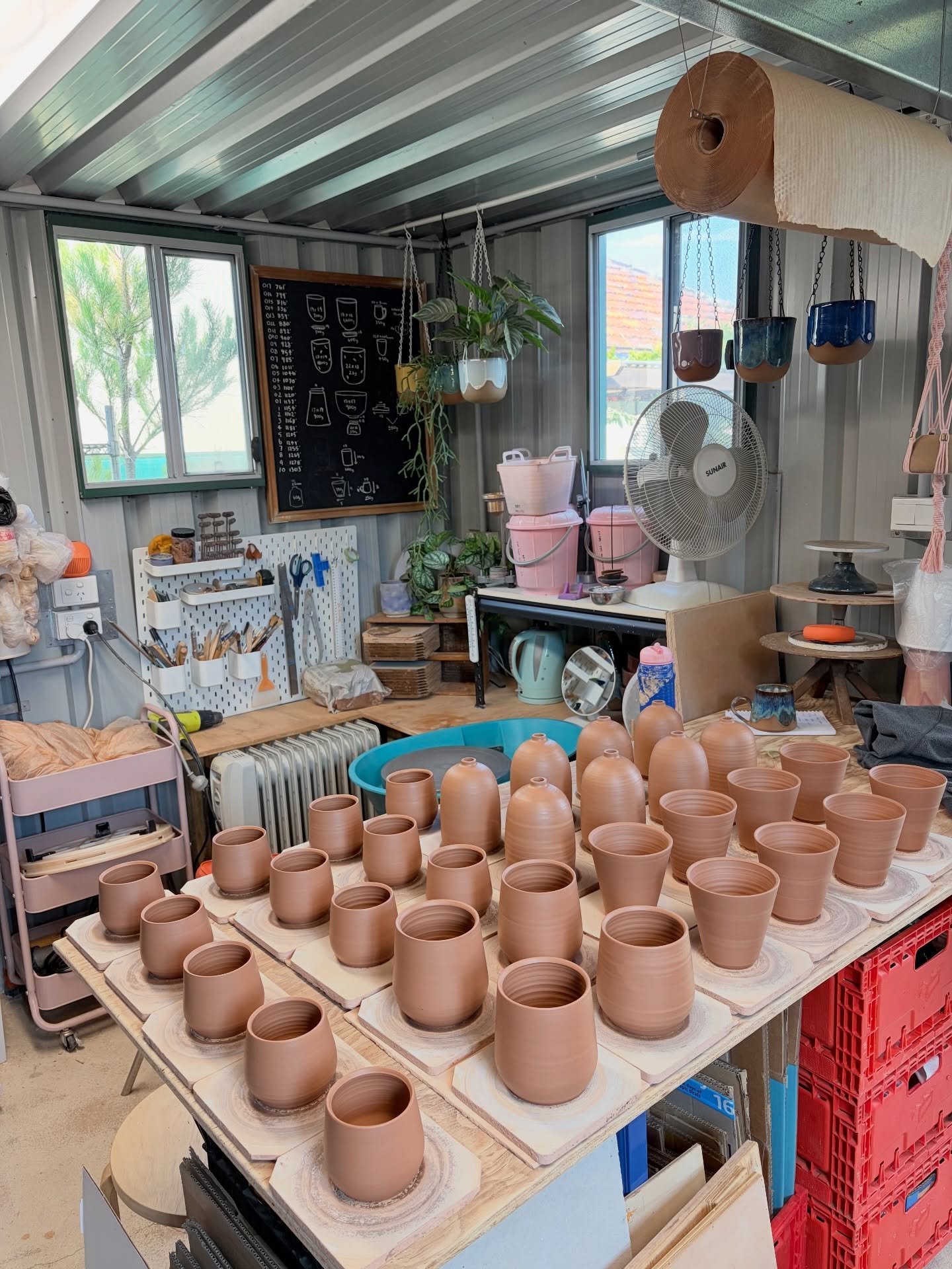 Time in the studio today.
Threw pots, listened to my book, built a lamp and broke off some glaze drips