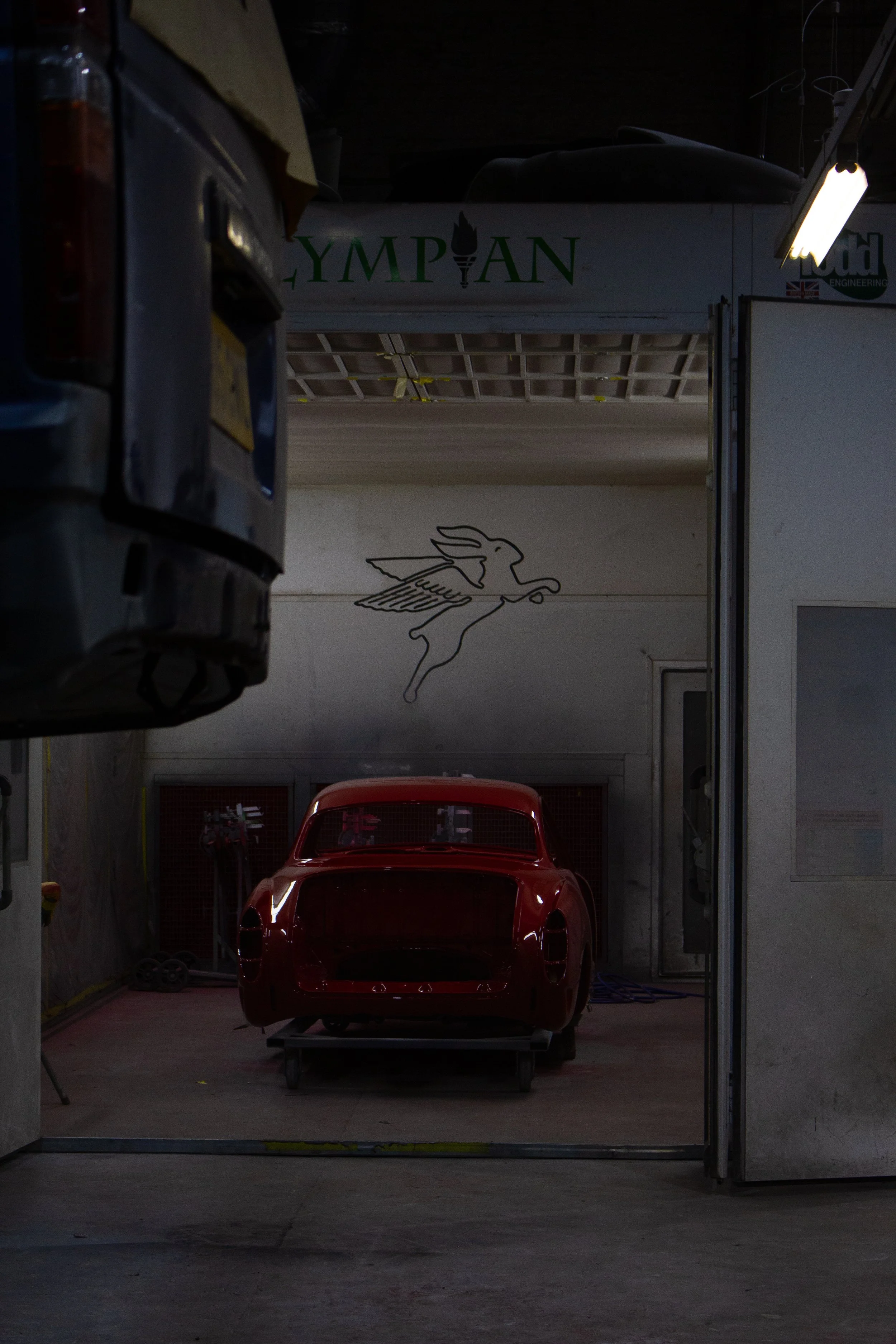 red ghia in booth.jpg