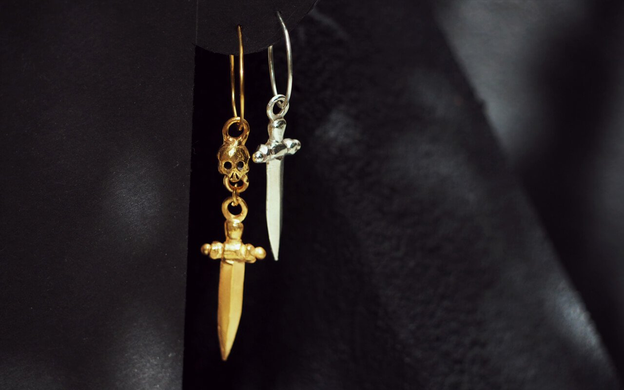 Gold-Valansino-skull-dagger-charm-earring-Silver-Orsino-dagger-earring-SLAB-Jewellery.jpg