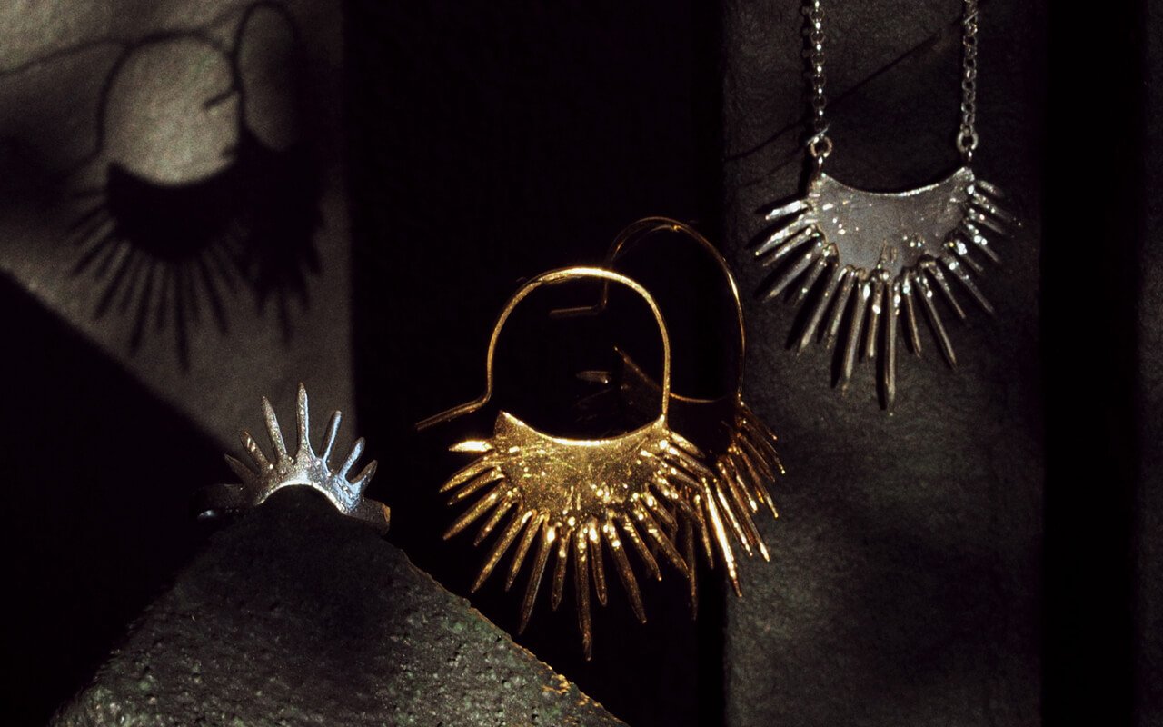 Morano-spiked-halo-group-ring-focus-SLAB-Jewellery.jpg