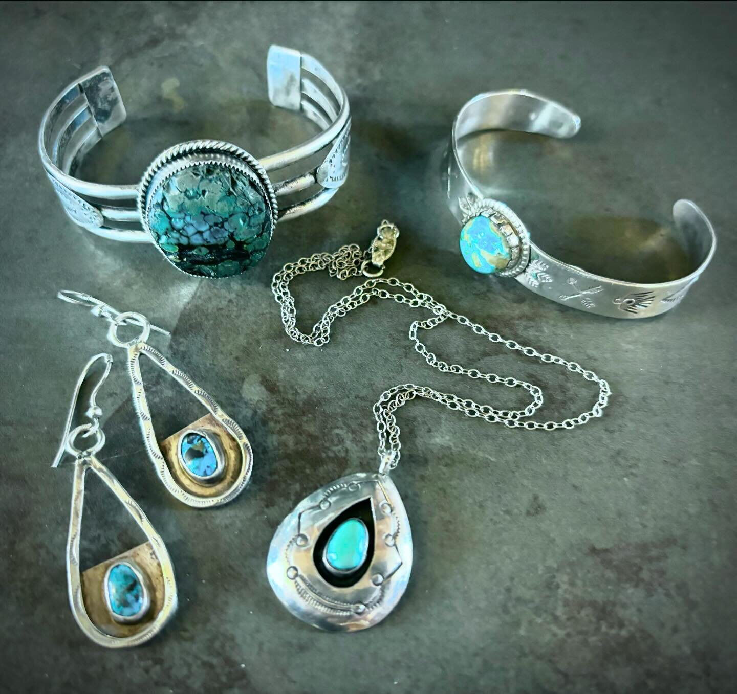Turquoise set in sterling silver is a combination that captures the essence of natural beauty and classic elegance. The vibrant blue-green hue of the stone paired with the lustrous shine of sterling silver creates a contrast that is both eye-catching