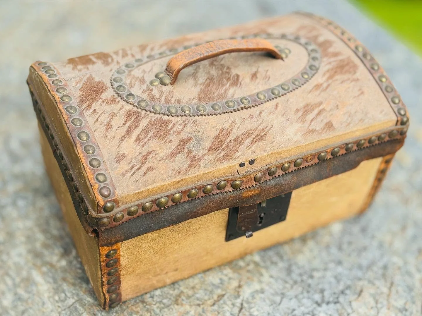 This handsome document box was crafted by none other than Nathan Neat. With a name like that, it&rsquo;s no surprise he was a master saddle, cap and trunk maker operating out of Boston.

Covered in worn hide, studded with brass, and secured with its 
