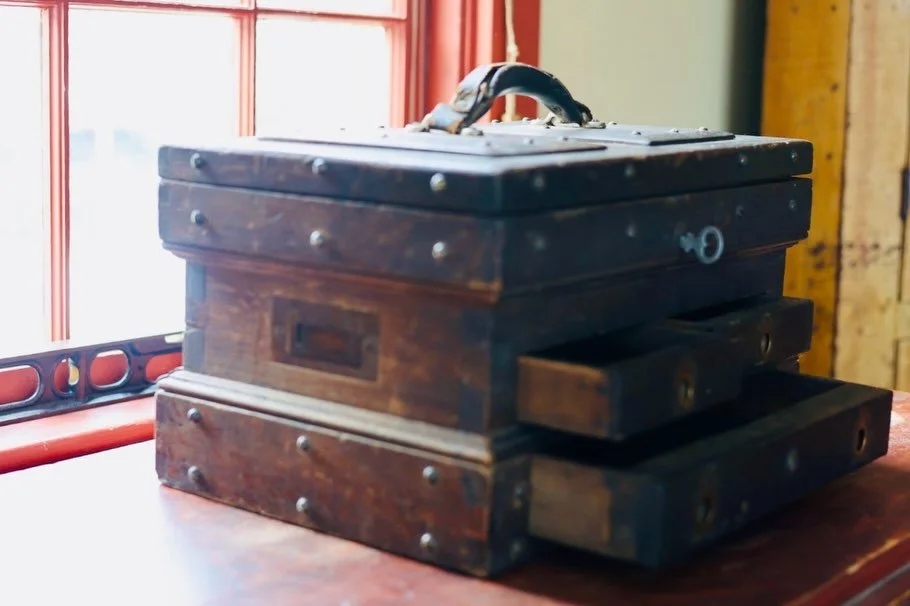 A vintage machinist&rsquo;s chest made for precision work.

Multiple shallow drawers once held micrometers, gauges, and calipers. Beautiful oak construction with dovetail joinery, inset brass pulls, a sturdy leather handle, and a special place to pro