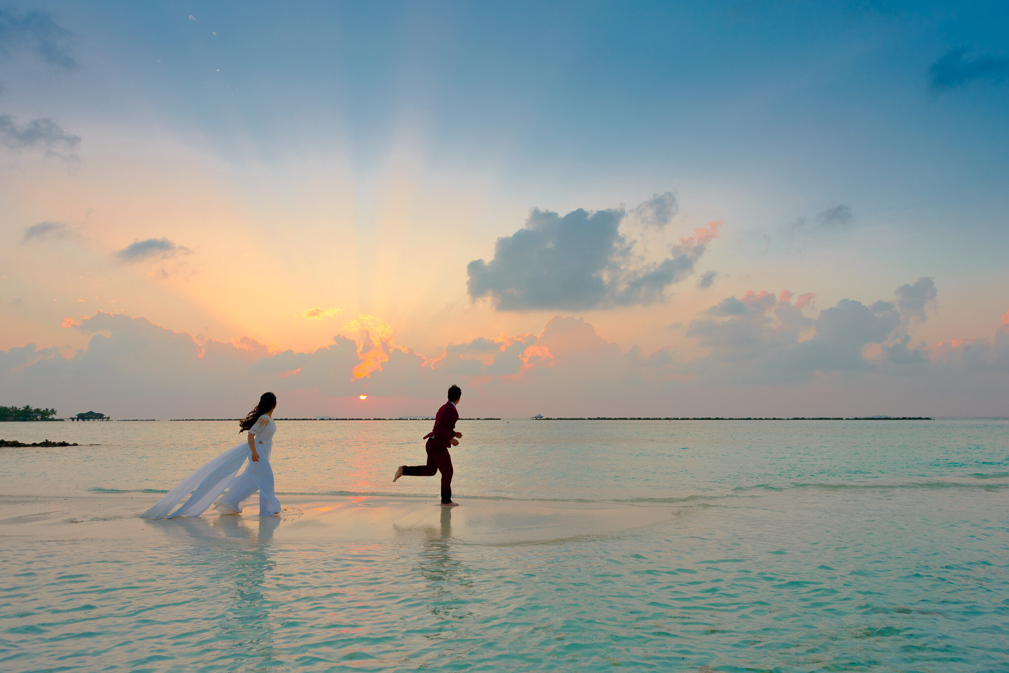 Man and Woman Standing at Seashore.jpg