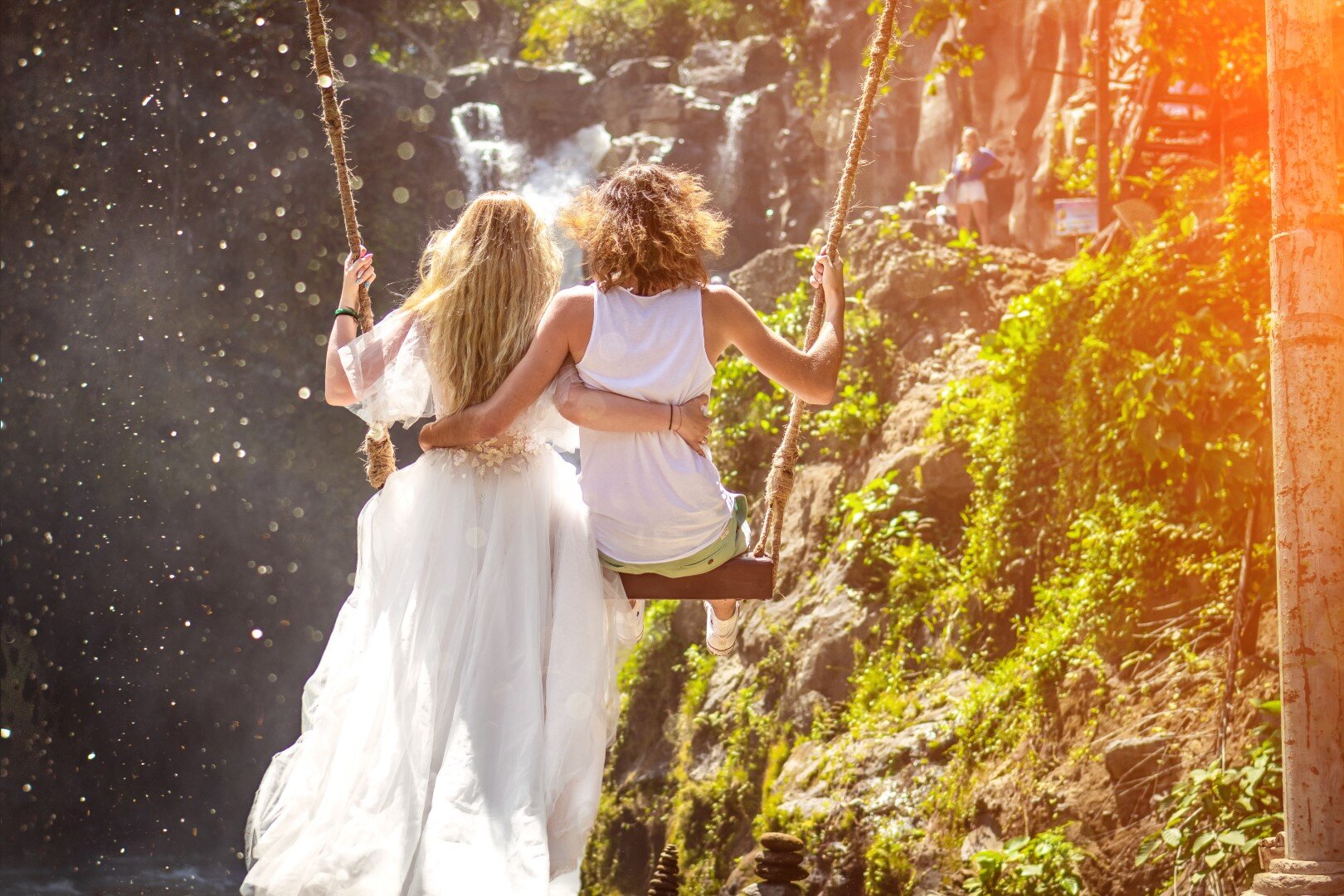 Canva - Woman and Woman Riding Wooden Swing in Front of Rock Formation.jpg
